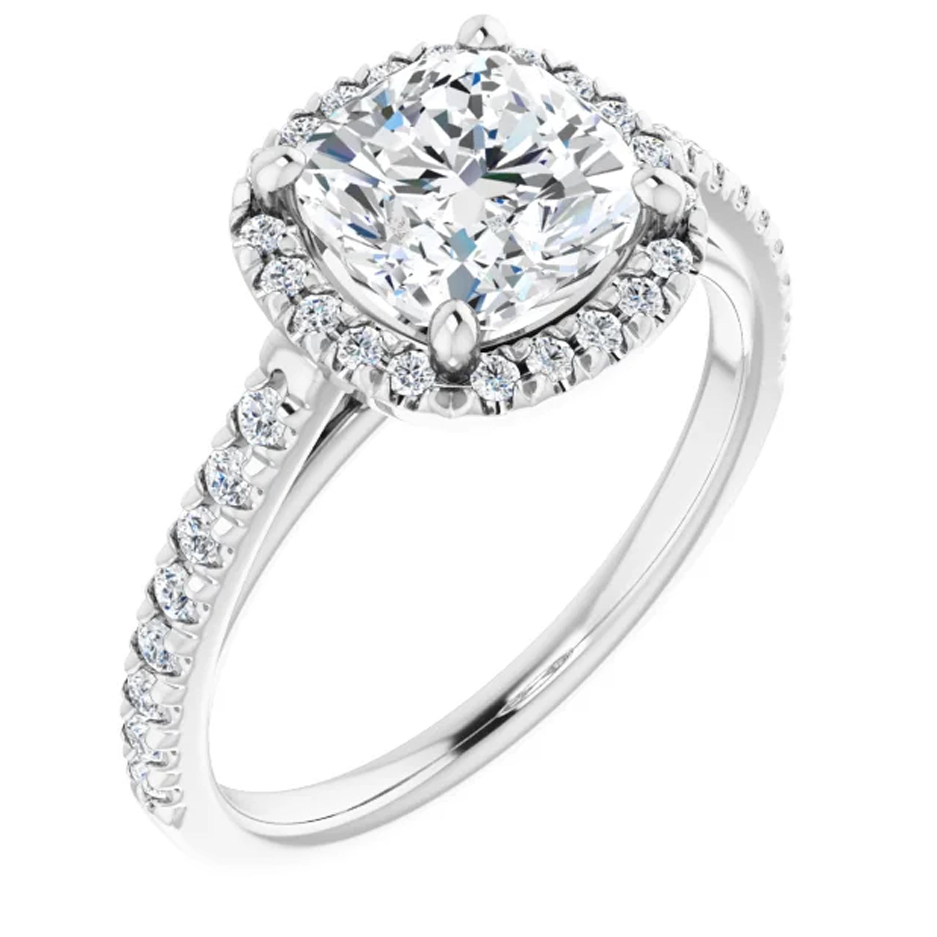 Surrounded by a halo of white shimmering diamonds, the cushion cut GIA certified diamond shines brilliantly in the center. Additional diamonds line the shank of this glamorous engagement ring. Complementing the wedding ring, a dainty matching