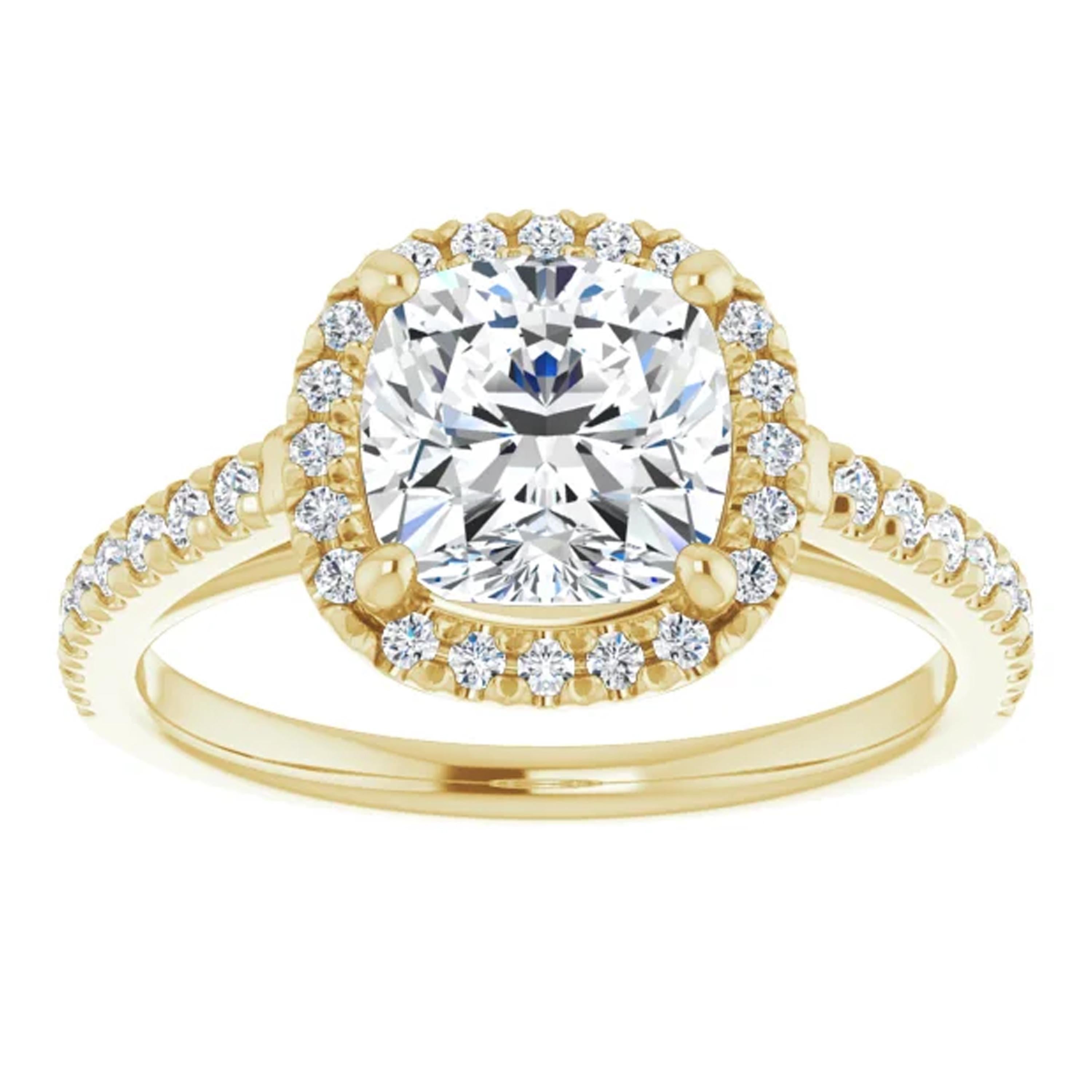 Handcrafted in 14k yellow gold, shimmering white diamonds surround the GIA certified center stone on this engagement ring. Closely set together with exposed sides additional diamonds line the shank. 

Style Number: ScintilleNora-1872589

Center