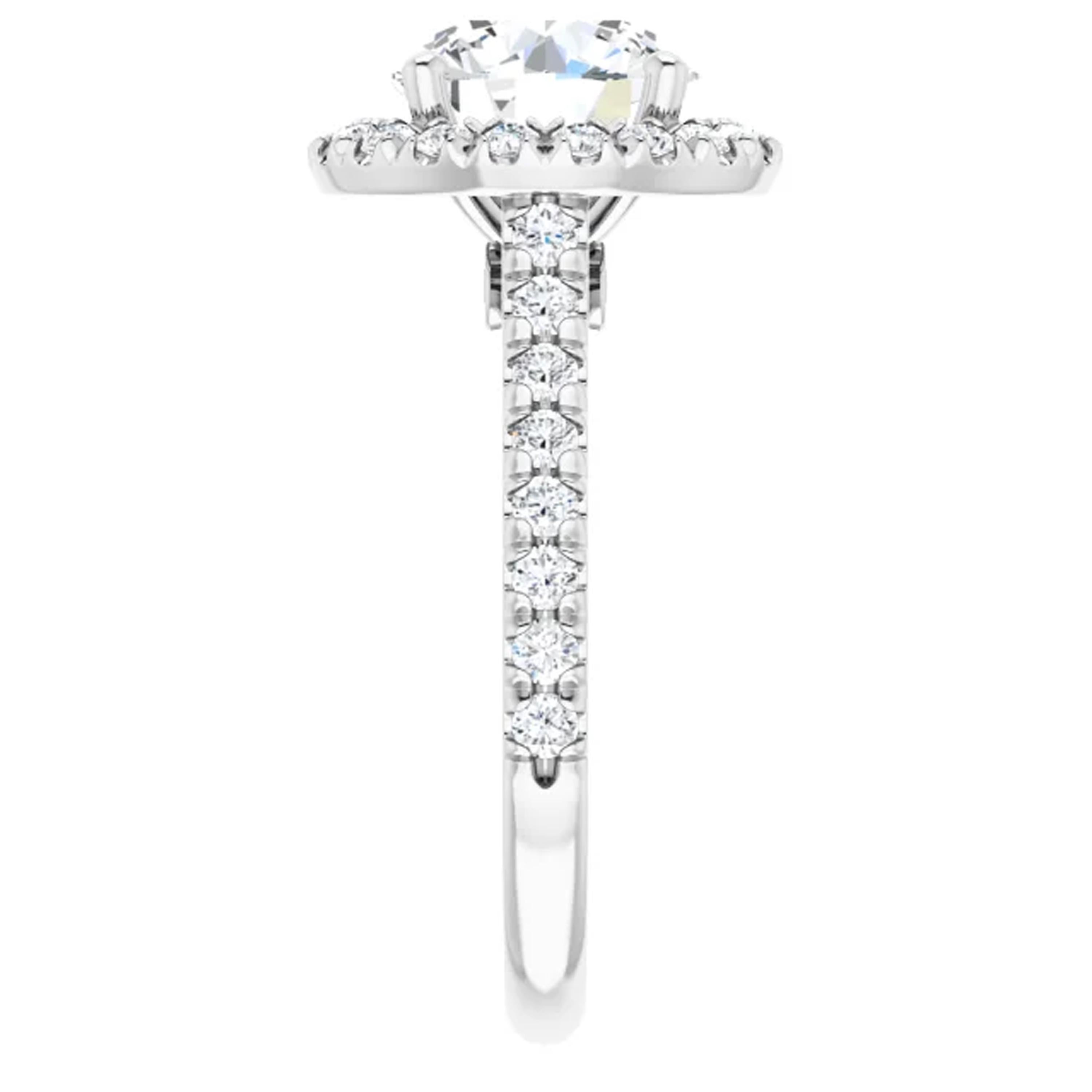 Shimmering french pave diamonds dance along the shank of this Valorenna engagement ring. Additional white lustrous diamonds surround the halo and amplify the center stone. Valorenna's high-polish strikes noticeable brilliance.

Matching band sold