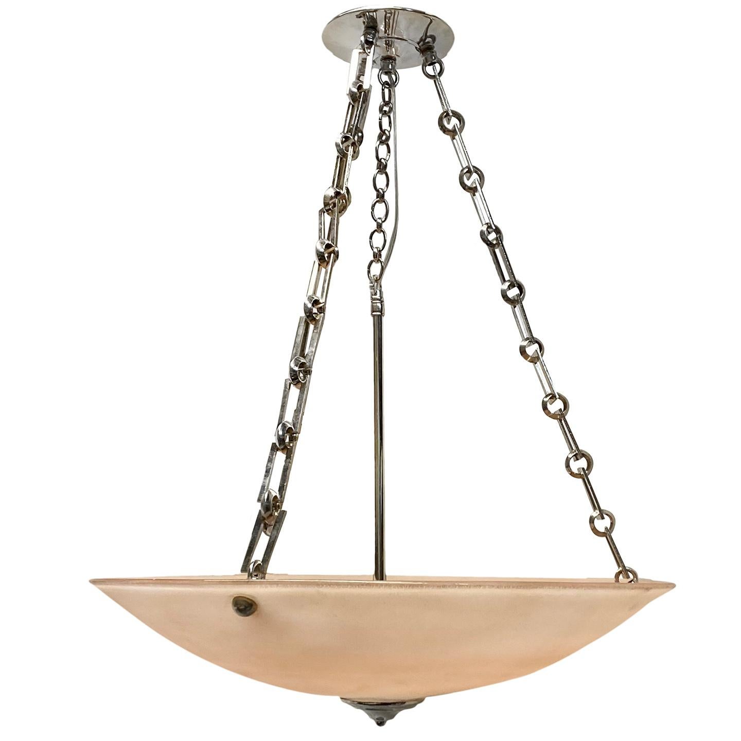 A circa 1920's French peach-coloured light fixture with nickel-plated chains.

Measurements:
Drop: 24