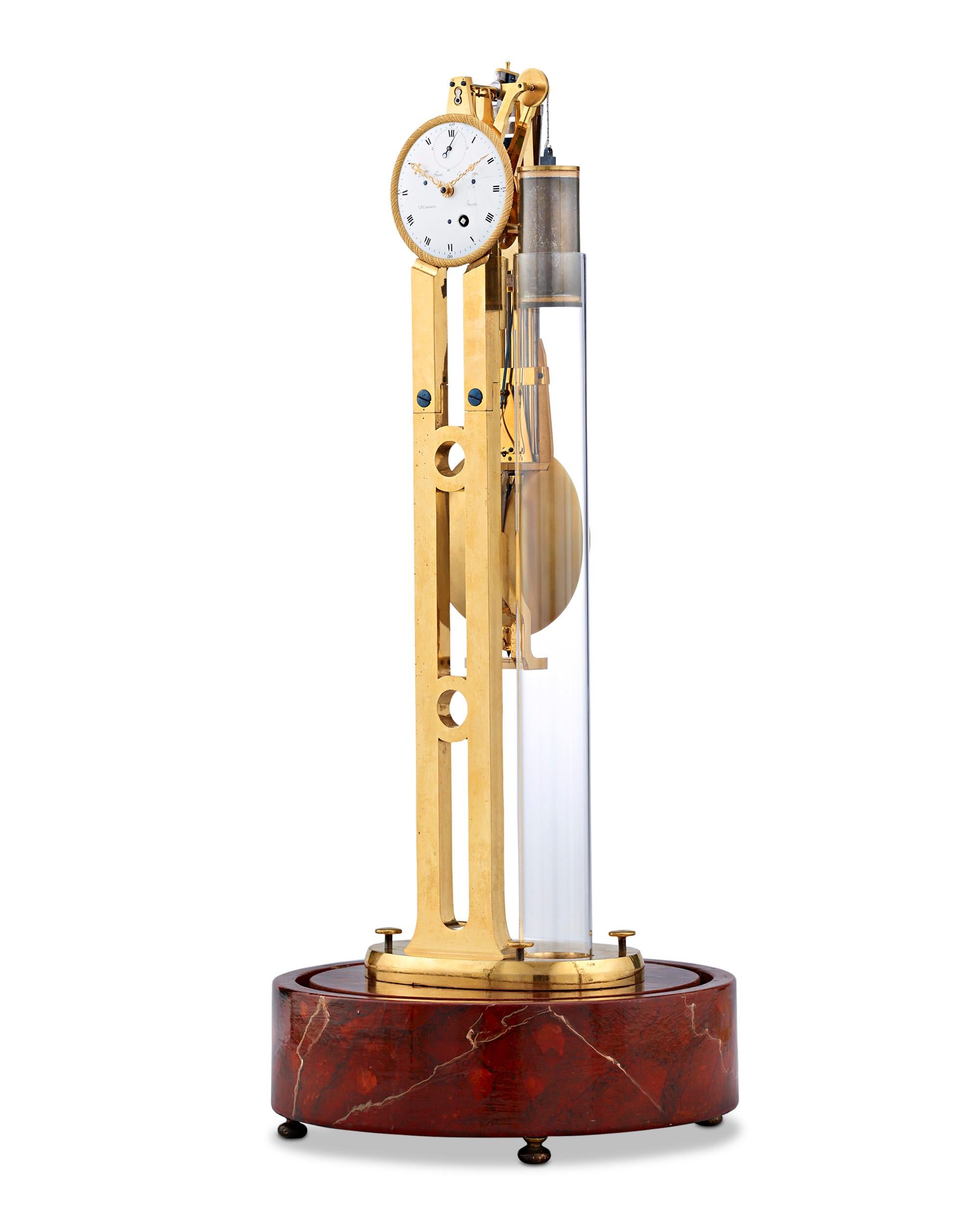 Impeccable quality and craftsmanship distinguish this extraordinary Louis XVI-era pendulum skeleton clock. Crafted from doré bronze in a towering, graceful design, the French timepiece is visually and mechanically stunning. The clock's single train