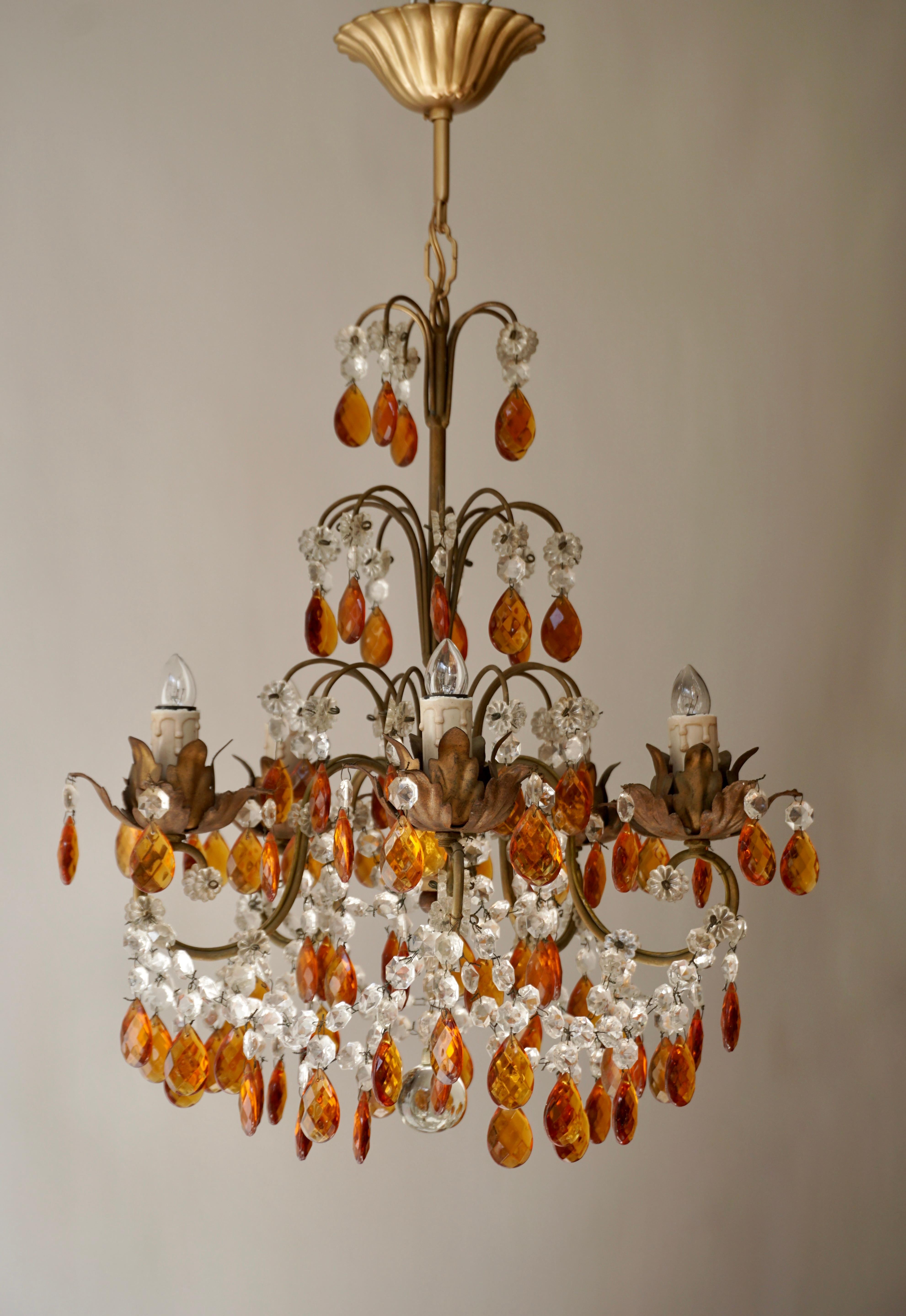 Elegant French midcentury cut crystal amber chandelier / pendant / flushmount by Baguès.
The light requires five single E14 screw fit lightbulbs (45Watt max.) LED compatible.

Measures: Diameter 45 cm.
Height fixture 50 cm.
Total height 65 cm.


  