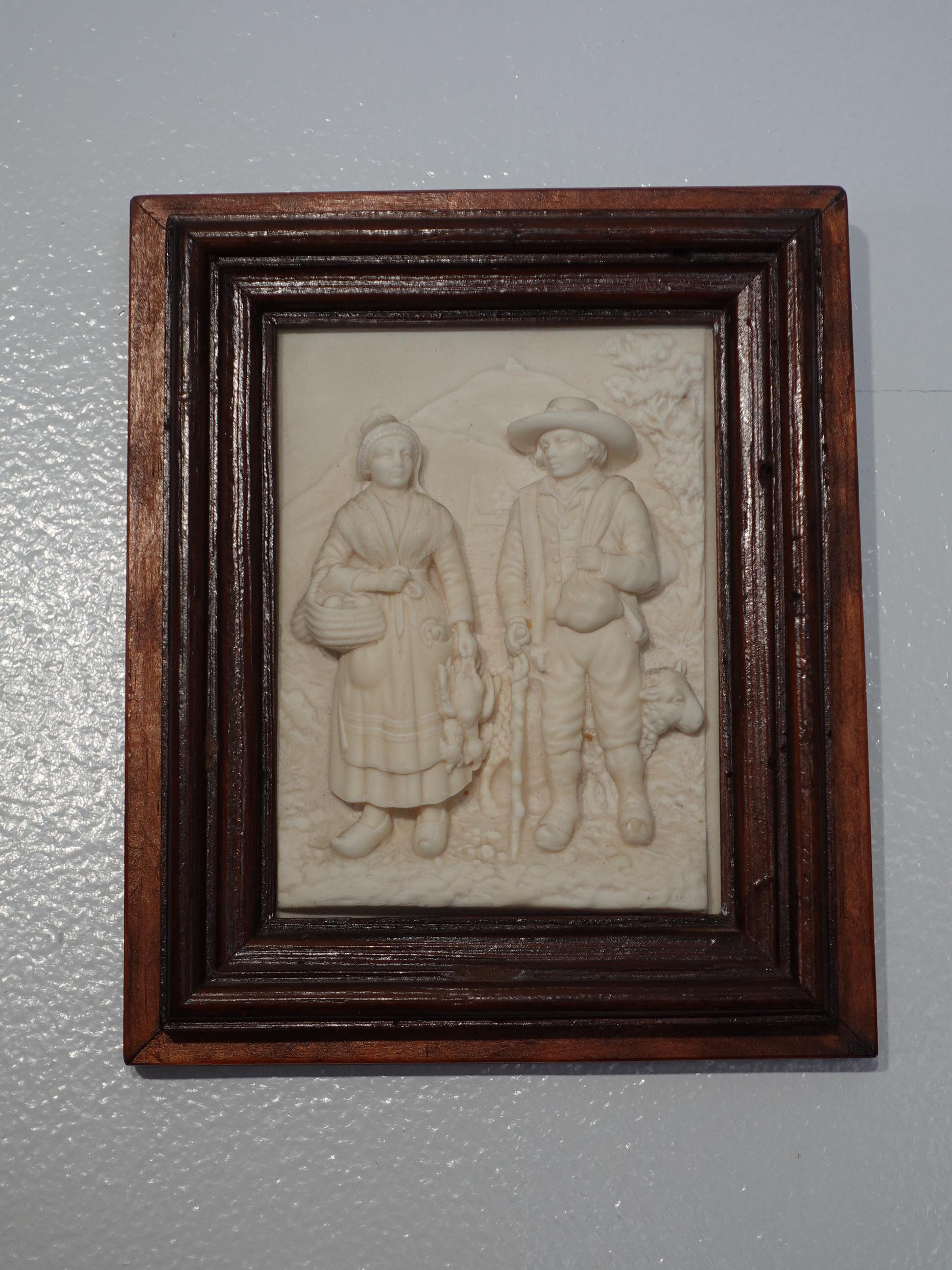 France
20th Century
Bas relief depicts a young woman carrying fowl and a young man with a sheep. The relief was created by dissolved limestone in water running from stalactites into a copper mold.

Dimensions
Limestone 5 1/8
