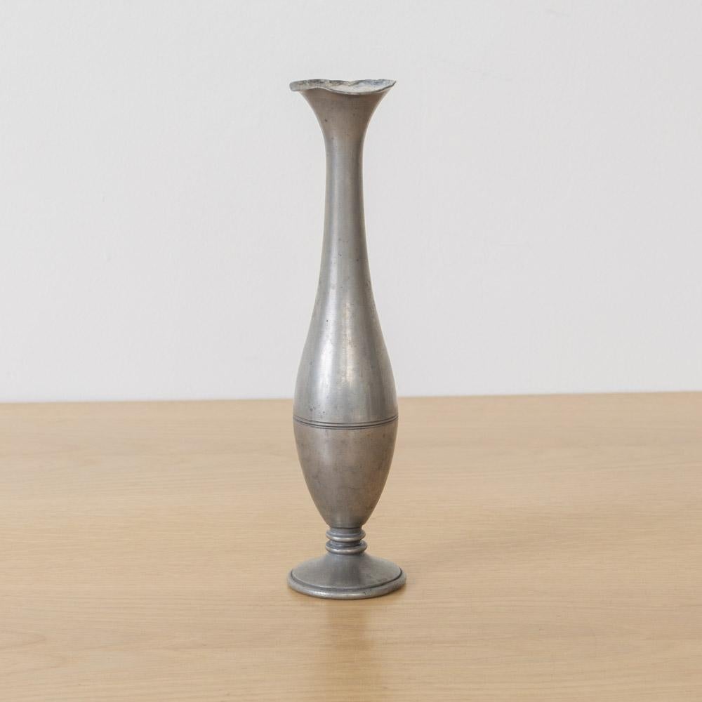 Beautiful decorative pewter bud vase from France, 1950s. Trumpet shape with fluted rim. Original finish shows nice age and patina. Stamped on the underside.