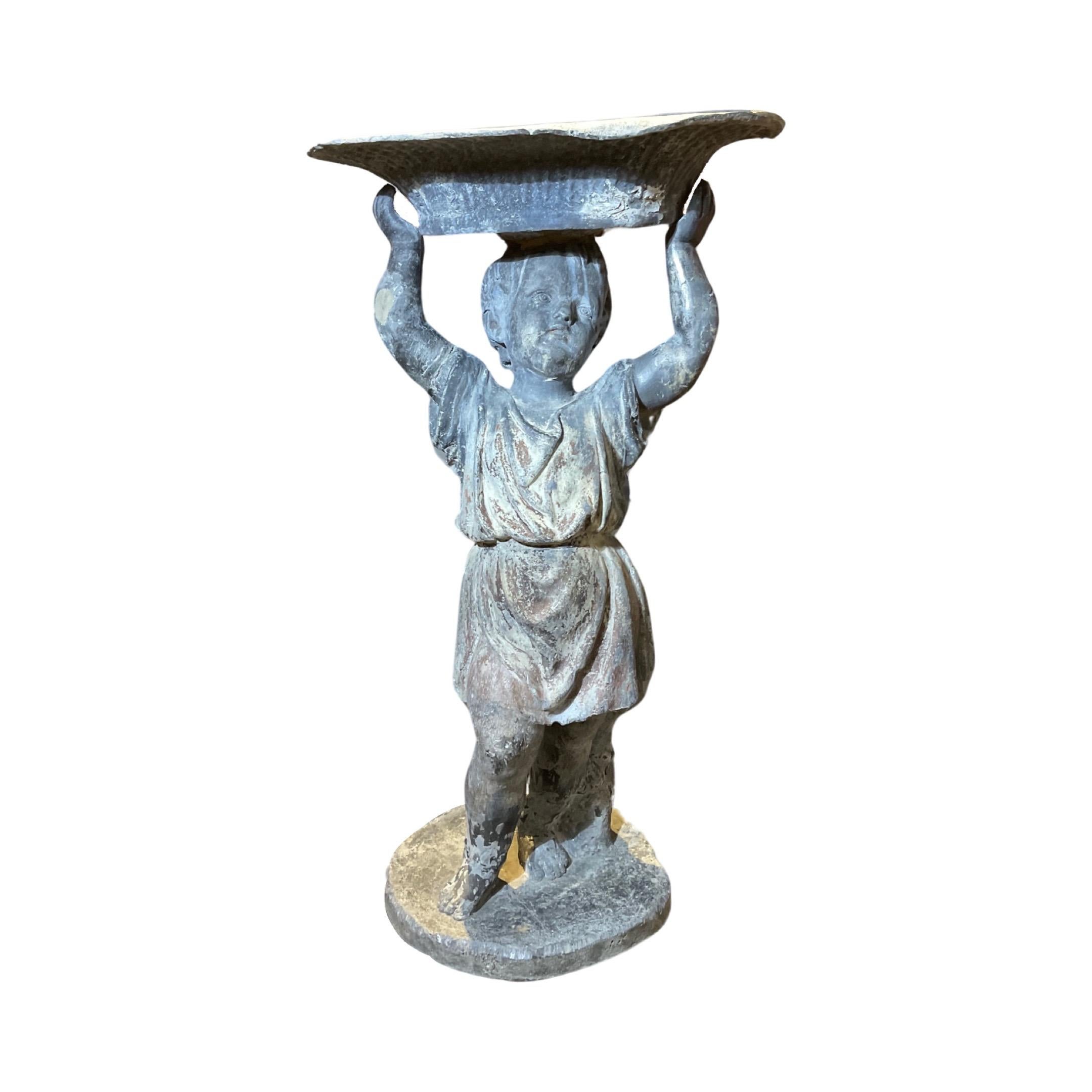 This French pewter cherub birdbath from the early 17th century is the perfect way to attract and encourage wildlife to your outdoor space. Made of luxurious pewter, the cherub birdbath is a timeless design perfect for any garden.