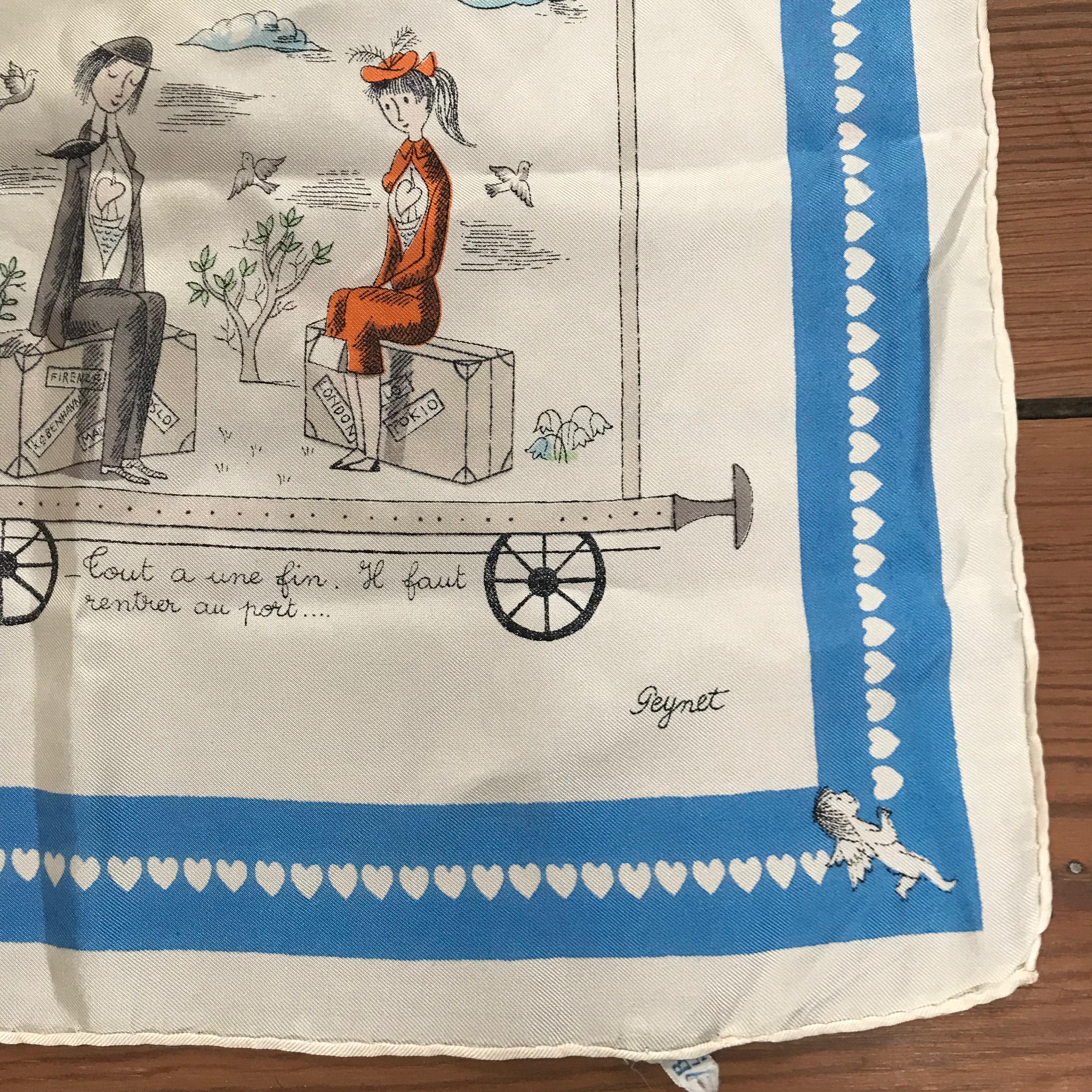 Vintage 1940's SILK SCARF ~FRENCH~PARIS~PEYNET LOVERS
This lovely blue and white silk scarf was made in Lyon ,France by Baccaret . Featuring the ever popular Peynet Lovers. It is titled: LE BEAU VOYAGE des AMOUREUX de PEYNET, or loosely translated -
