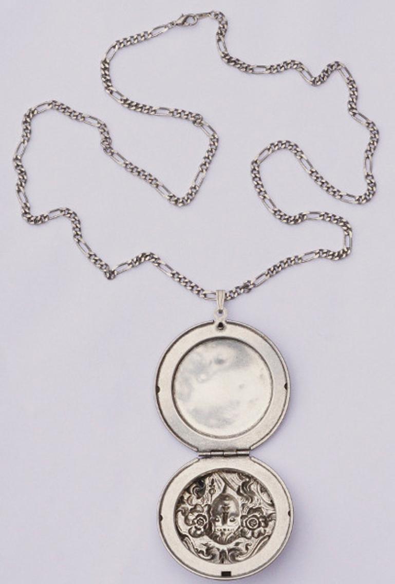 Pierre Bex silver plated necklace and opening locket, featuring a beautiful Art Nouveau style lady's face. The long curb link necklace measures 71.5cm / 28.15 inches, and is stamped PB. The large locket is diameter 5.5cm / 2.16 inches.

This is a