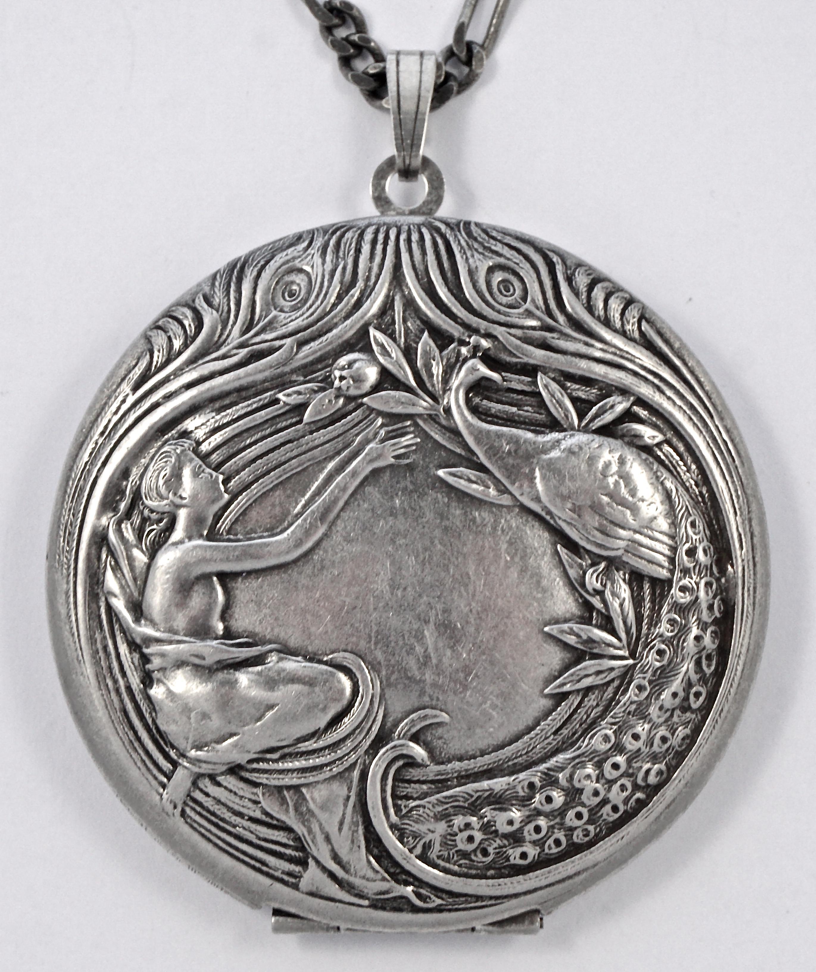 Pierre Bex antique finish silver plated Art Nouveau style necklace and opening locket, featuring a lovely peacock design. The long curb link necklace measures 71.5cm / 28.15 inches, and is stamped PB. The large locket is diameter 5.5cm / 2.16