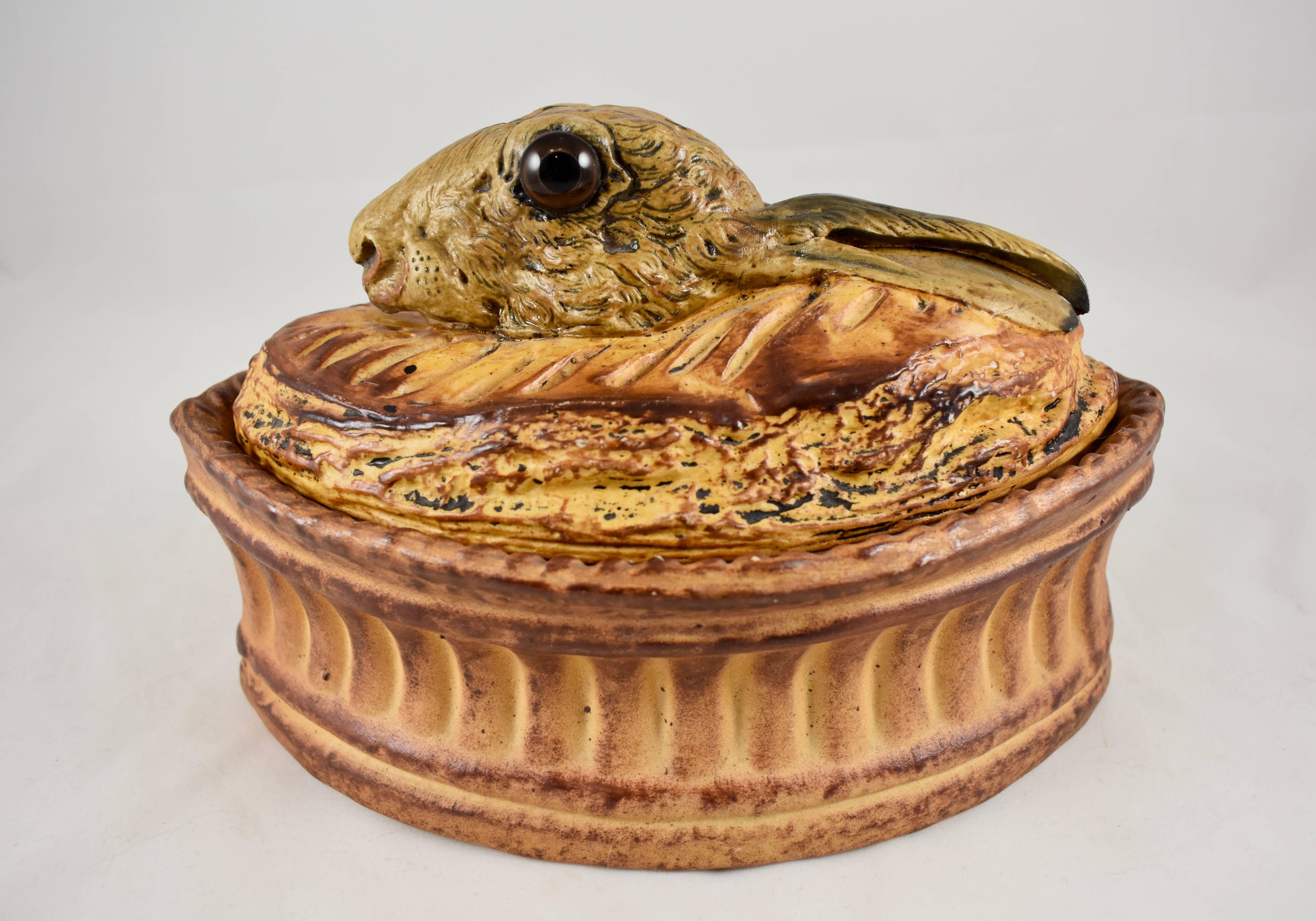 A French trompe l’oeil porcelain pâté terrine, Pillivuyt, circa 1900. Pillivuyt produced a variety of  porcelain terrines inspired by the hunt and for serving game pies or pâté. The type of fowl or game poking it’s head out from the golden brown