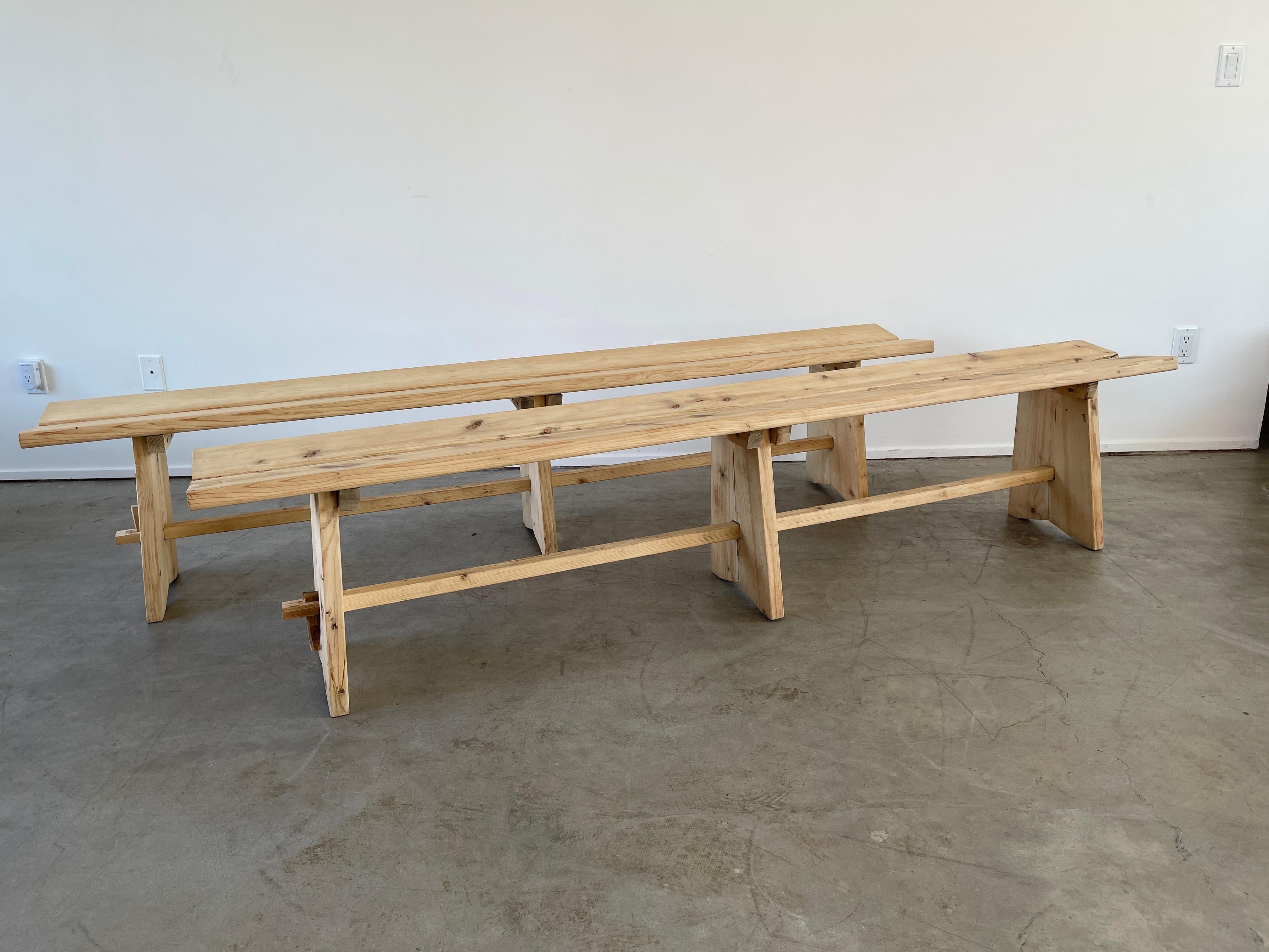 French pine benches - circa 1950's 
Solid construction with raw / natural grain 
Reminiscent of Perriand style 
Priced individually.