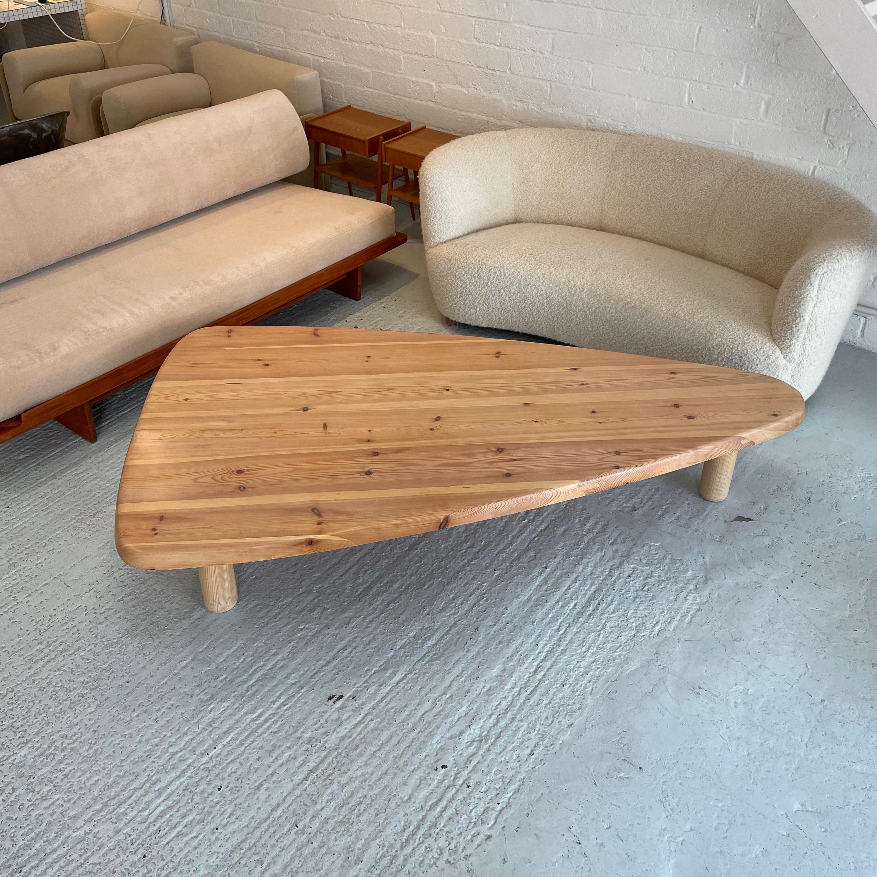 Height: 40cm
Width: 199cm
Depth: 112cm

Date: 1970s
Materials: Pine

Description: A large vintage wooden living room coffee table of French manufacture from the 1960s. The large low coffee table is made entirely of pine wood, with beautiful grains,