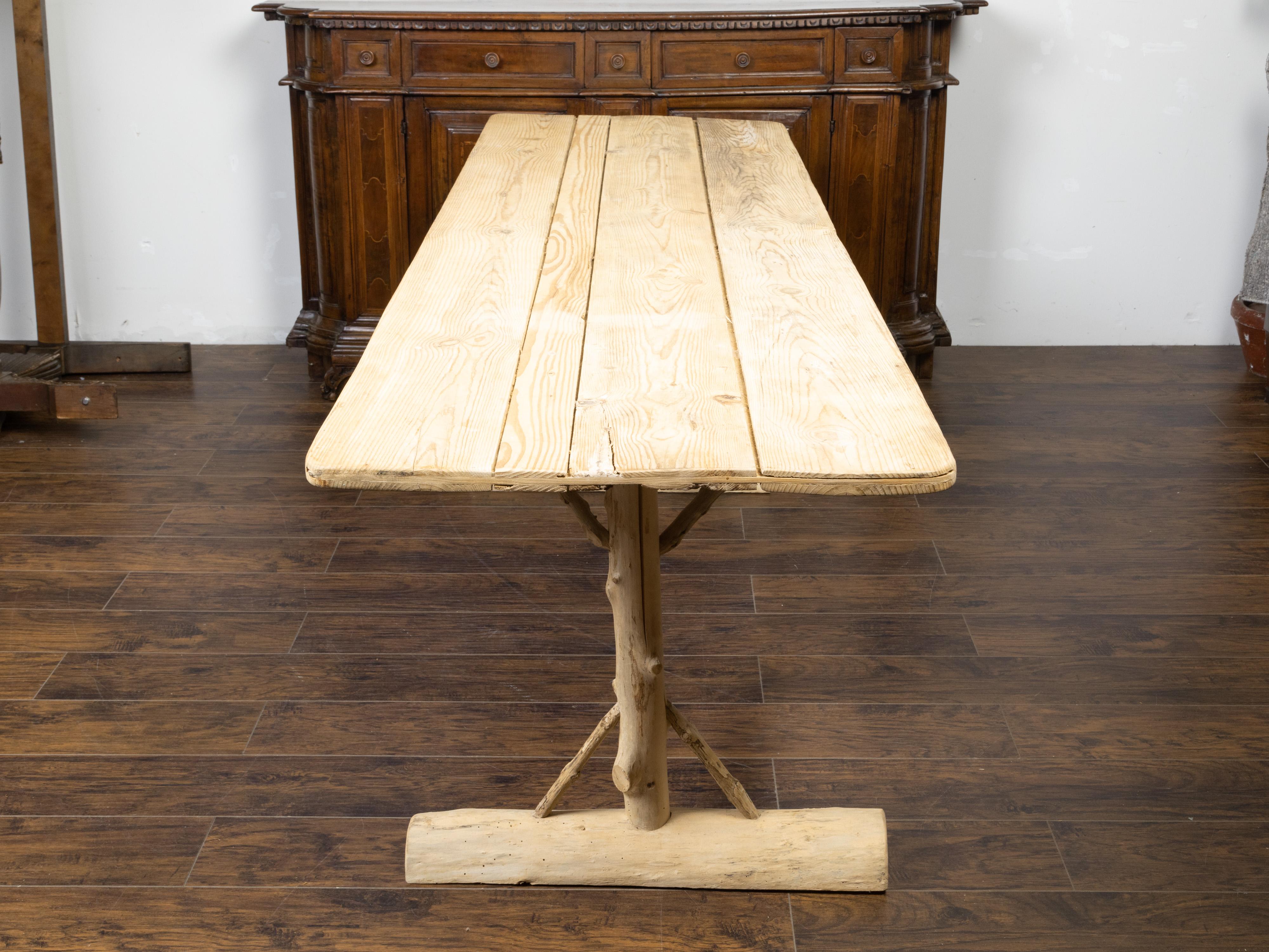 French Pine Farm Table with Twig Trestle Base from the Mid 20th Century In Good Condition In Atlanta, GA