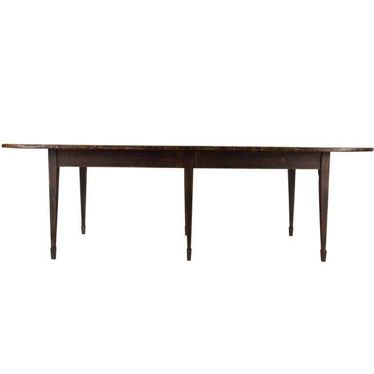 An elegant and unusual 19th century French farmhouse table in historic paint, circa 1840.