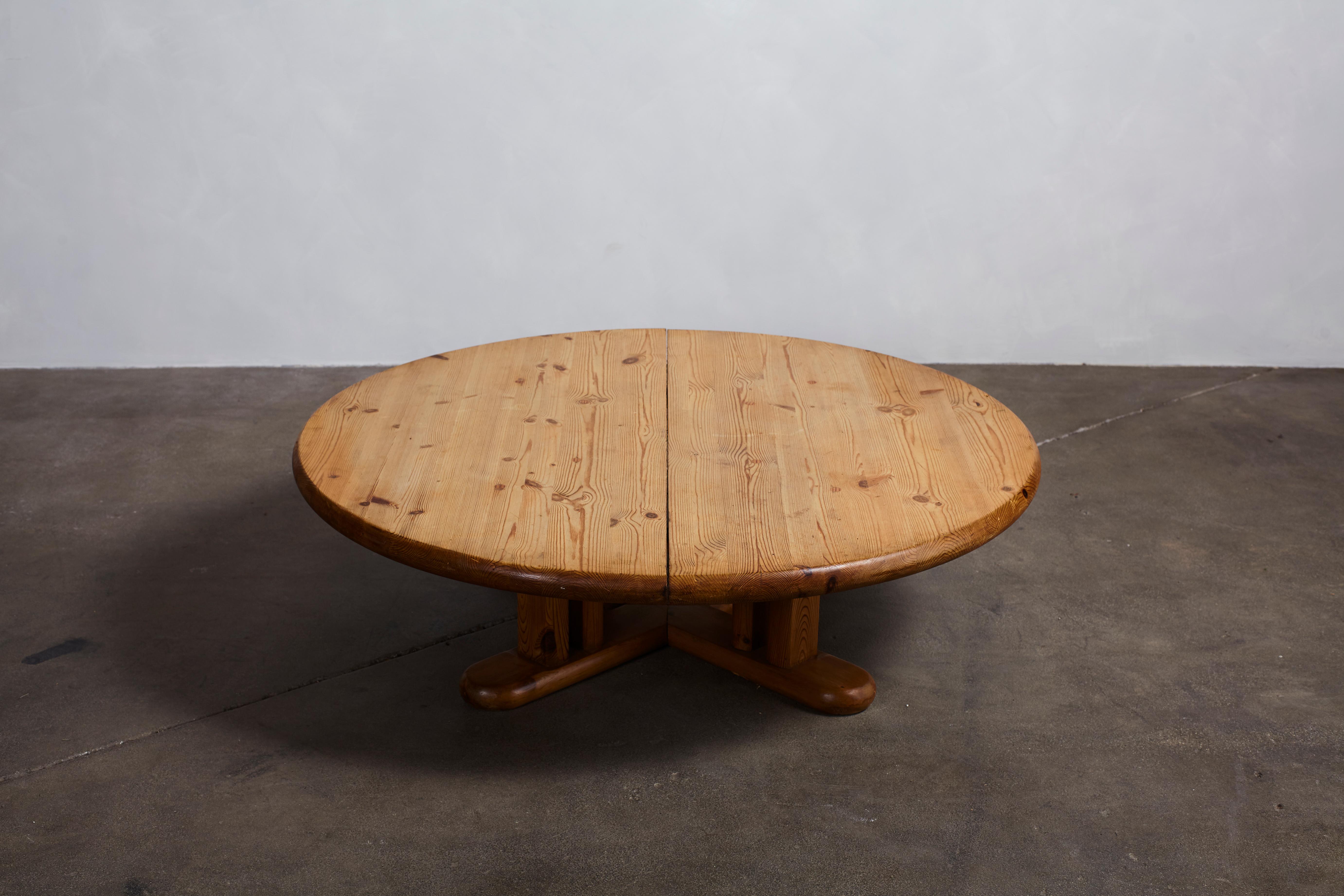 French pine round coffee table with cross leg base.