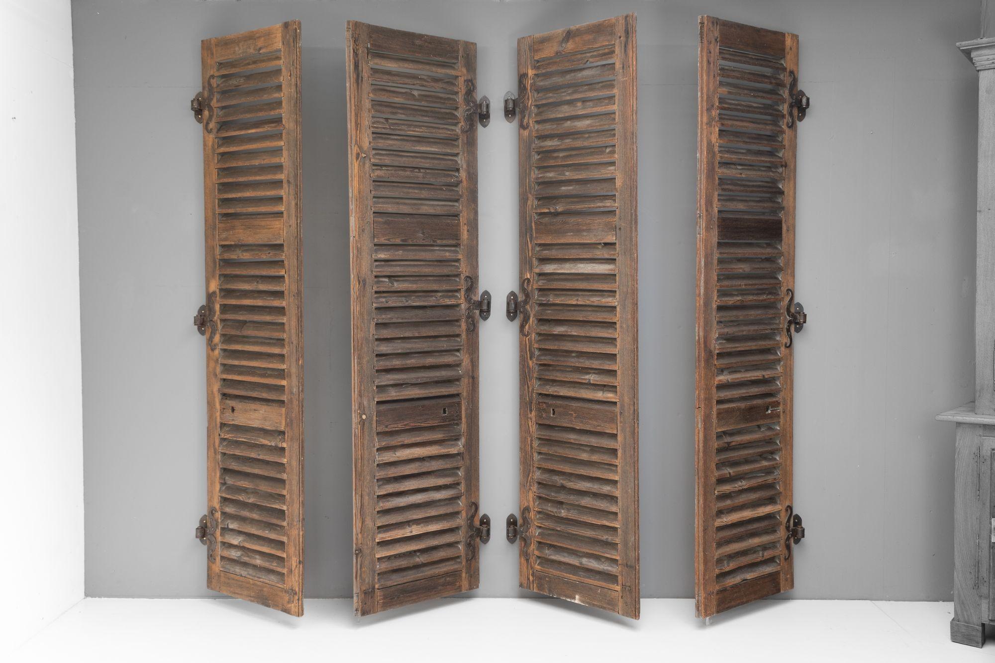 Two pairs of French pine shutters with original metal hinge parts. Circa 1850.

H 250cm x W 136cm x D 8cm

Please be in touch for an accurate shipping quote.
