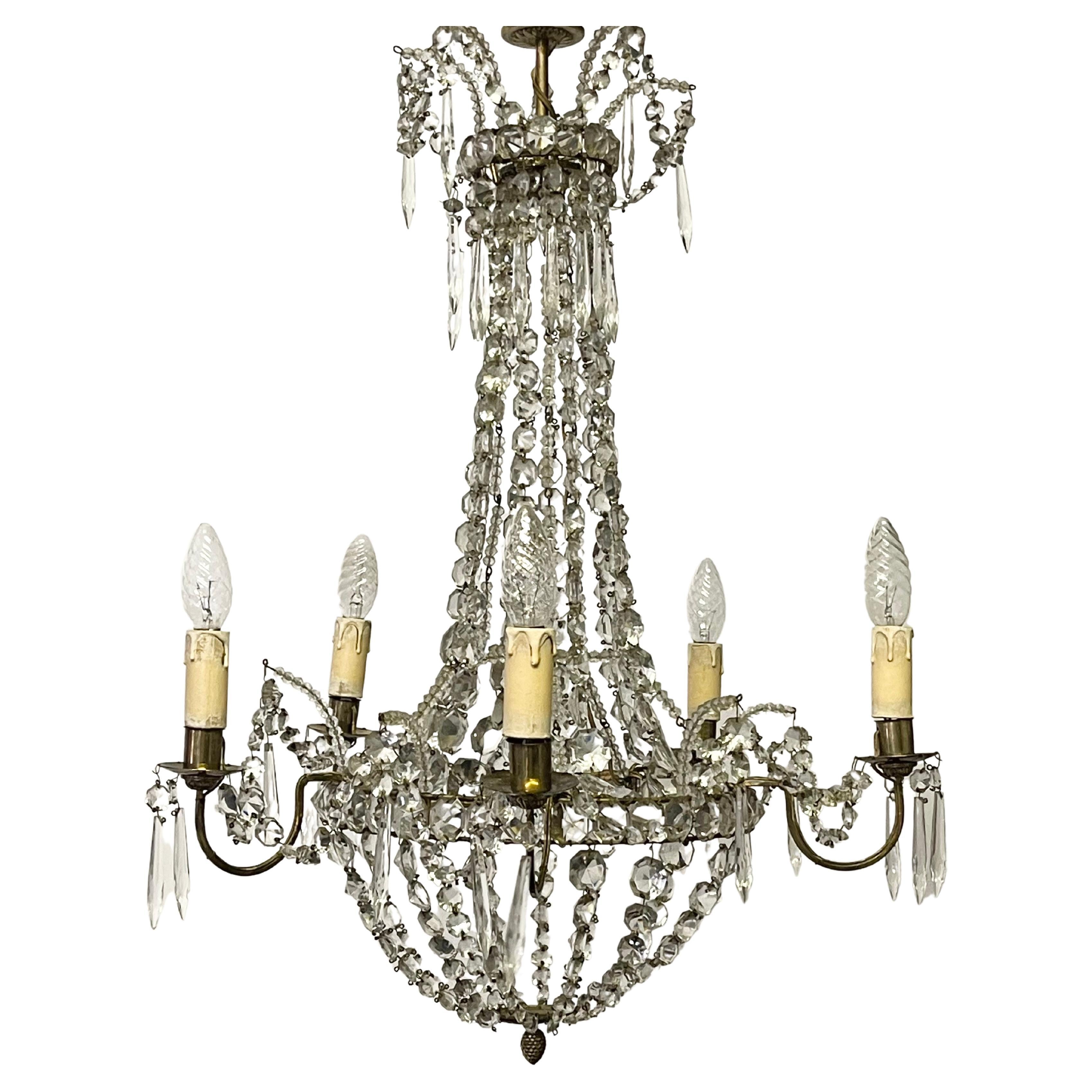 A lovely brass and beaded crystal chandelier, France, circa 1920s.
Socket: 5 x E14 for standard screw bulbs.
New wiring for US standards on request.





