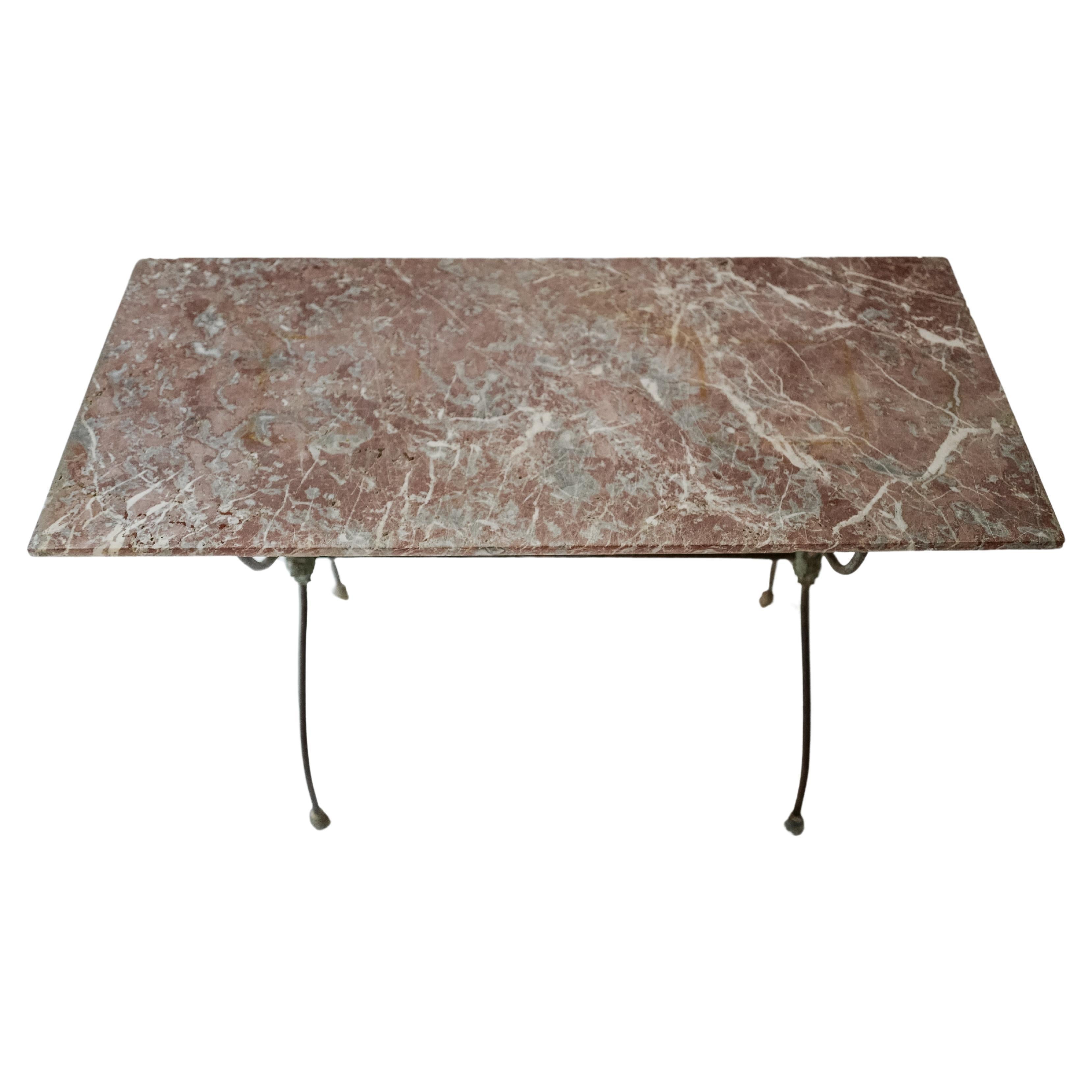 A stunning pink French marble and iron bistro garden table circa 19th Century. Top is separate from base. 