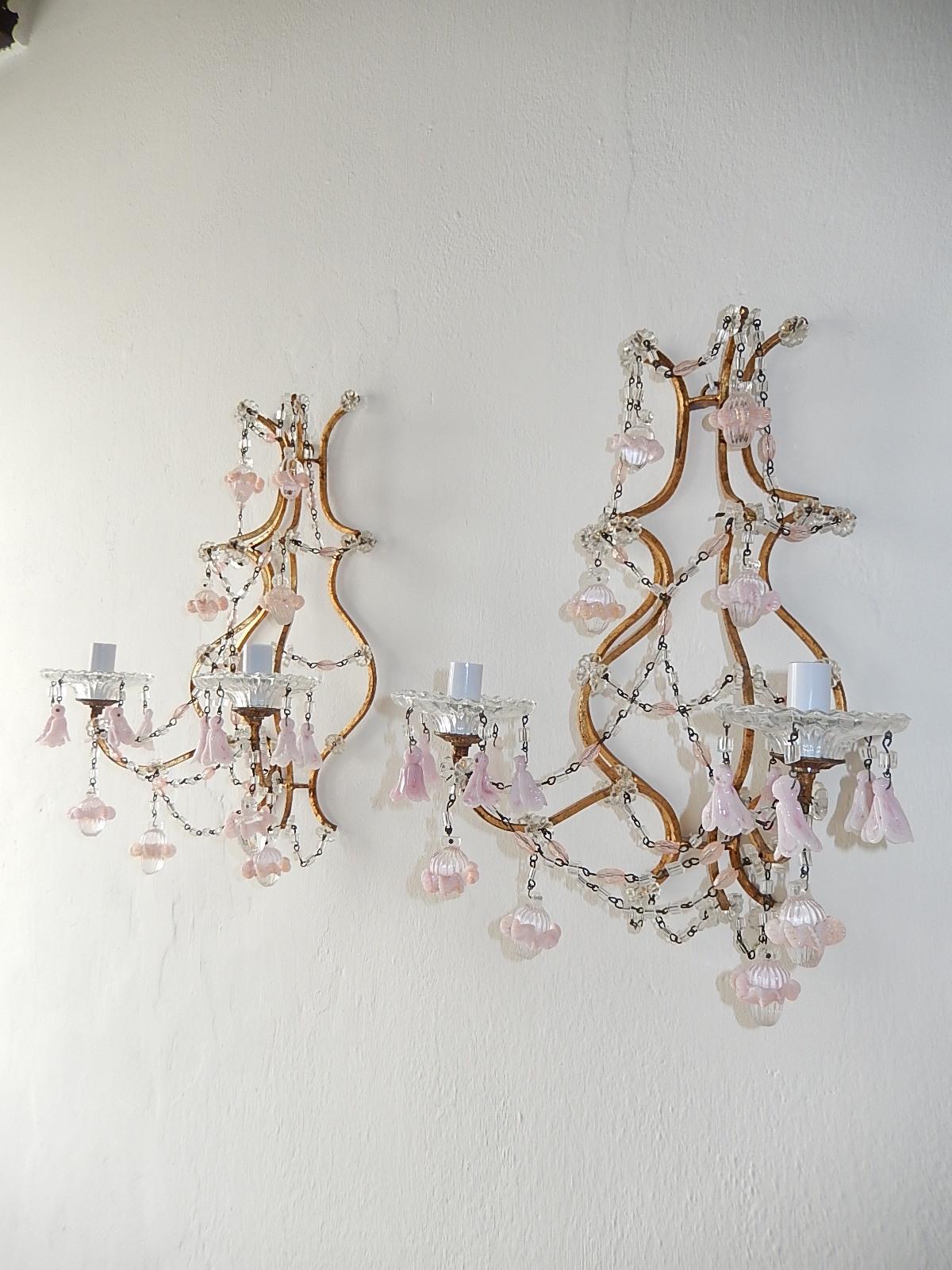 Housing 2-light, sitting in crystal bobeches, dripping in pink opaline flower bells. Gold gilt metal. Also adorning pink crystals and Murano balls with pink opaline ribbon encircling. Re-wired and ready to hang!