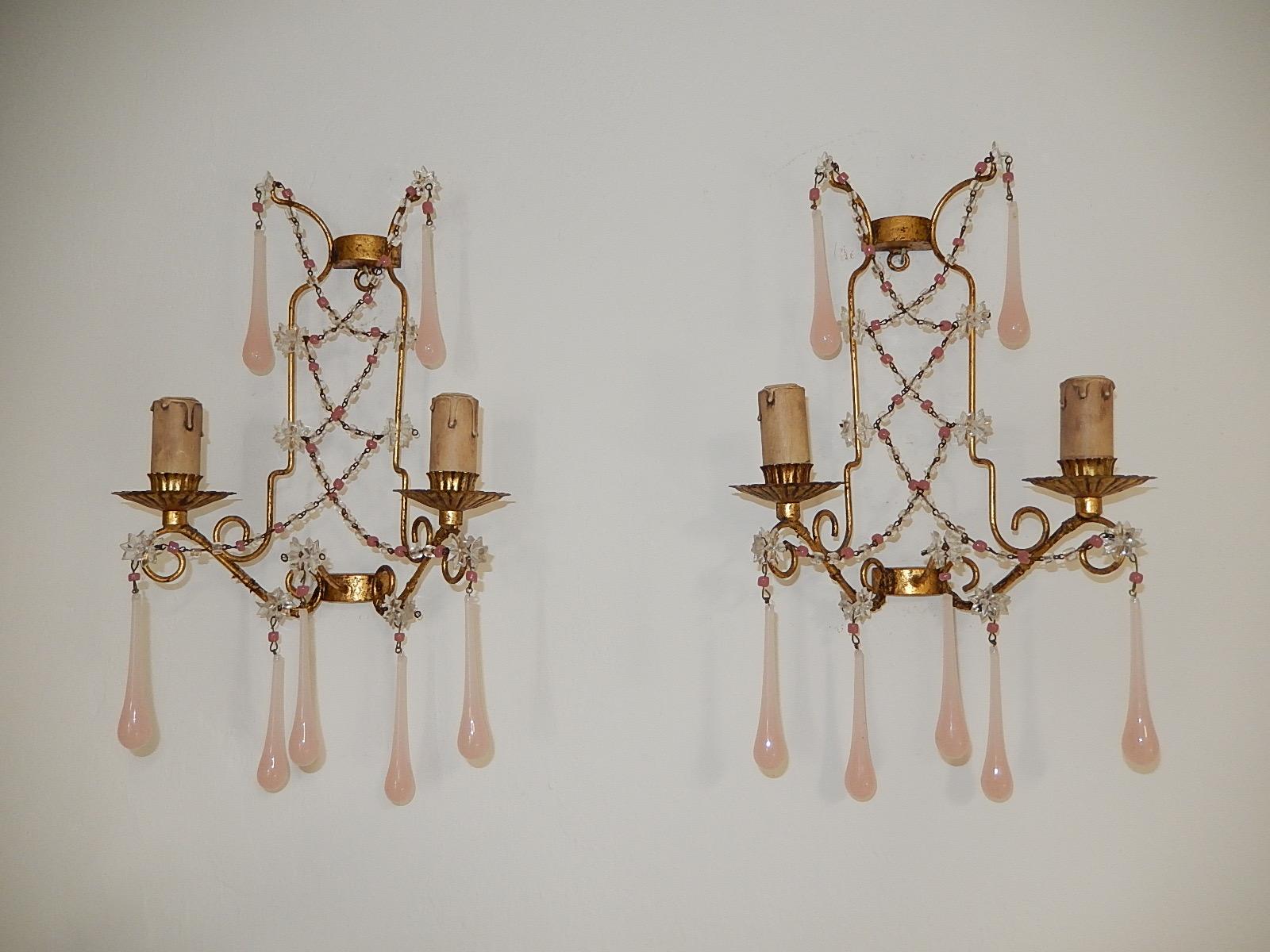 Housing 2-light, sitting in crystal bobeches. Will be re-wired with appropriate sockets for country and ready to hang! Swags of pink opaline and clear beads and star prisms. Adorning Murano pink opaline drops. Free priority UPS shipping from Italy,