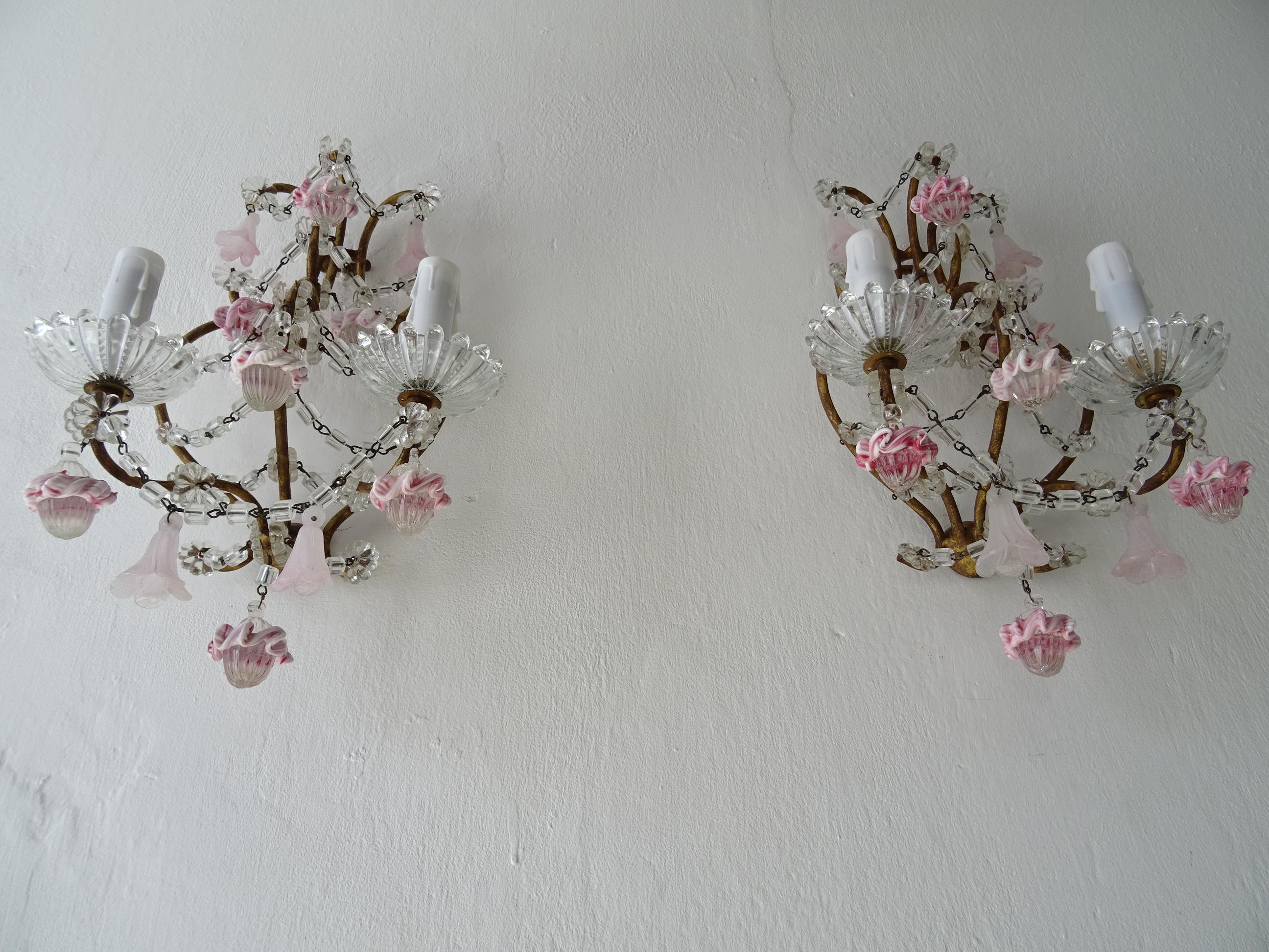 Housing 2-light, sitting in rare crystal bobeches. These will be rewired with certified UL US sockets for the USA and appropriate sockets for all other countries. Gold gilt metal. Adorning crystal florets, pink bells and rare ribbon Murano drops.