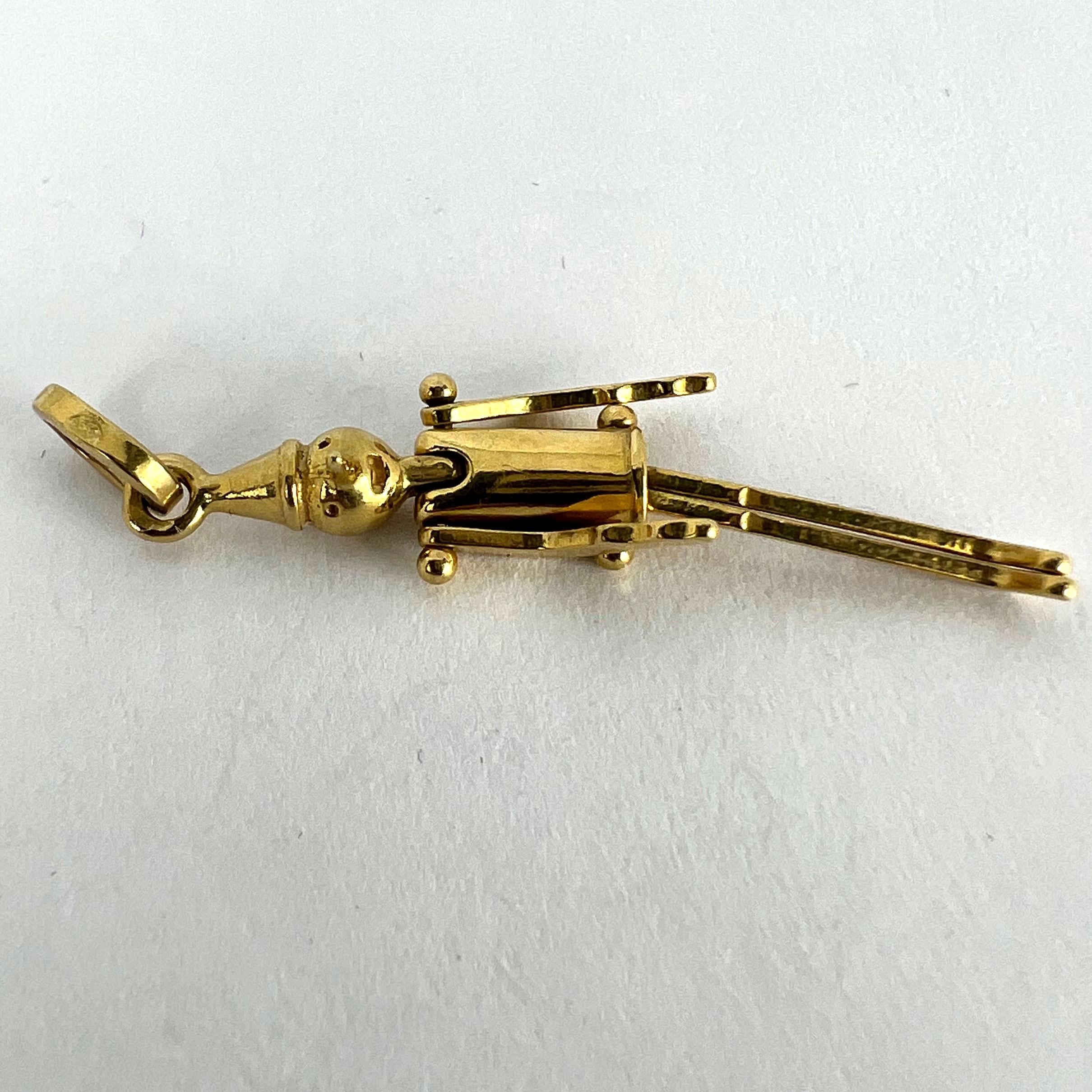 Ciondolo Charm in oro giallo 18 carati con Pinocchio Francese 10