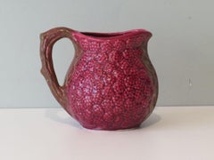 French pitcher in ceramic, barbotine, raspberry