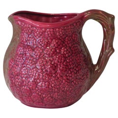 French pitcher in ceramic, barbotine, raspberry