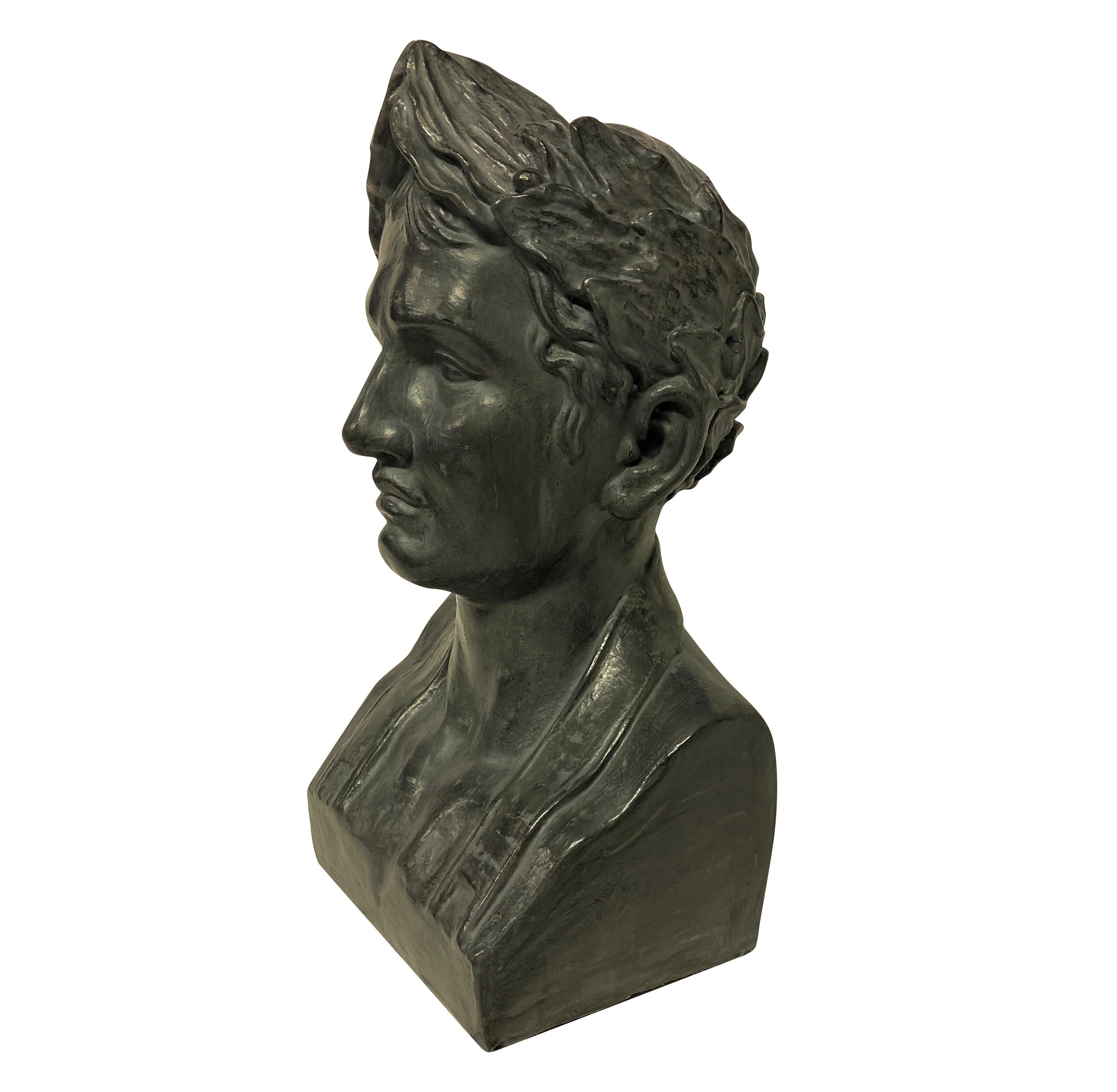 A French painted plaster bust of Napoleon as Emperor, in basalt grey.

