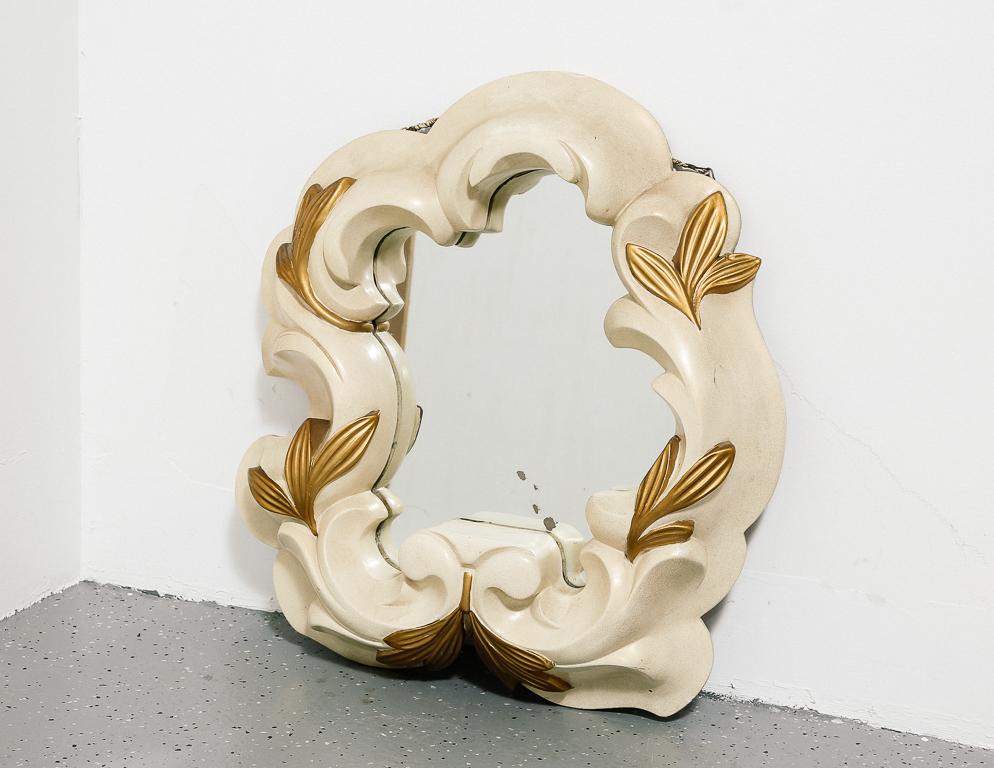 Vintage French plaster mirror with floral stylings. Gold painted leaves. In the manner of Serge Roche.