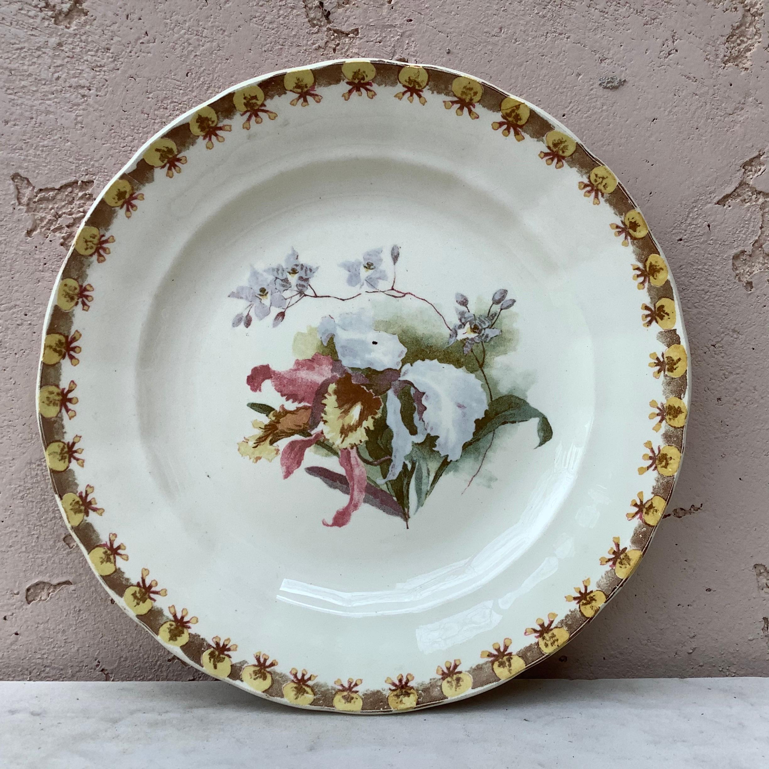 French plate with orchid signed Hippolyte Boulenger Choisy le Roi, circa 1890.
The manufacture of Choisy le Roi was one of the most important manufacture at the end of 19th century, they produced very high quality ceramics of all kinds as Majolica.