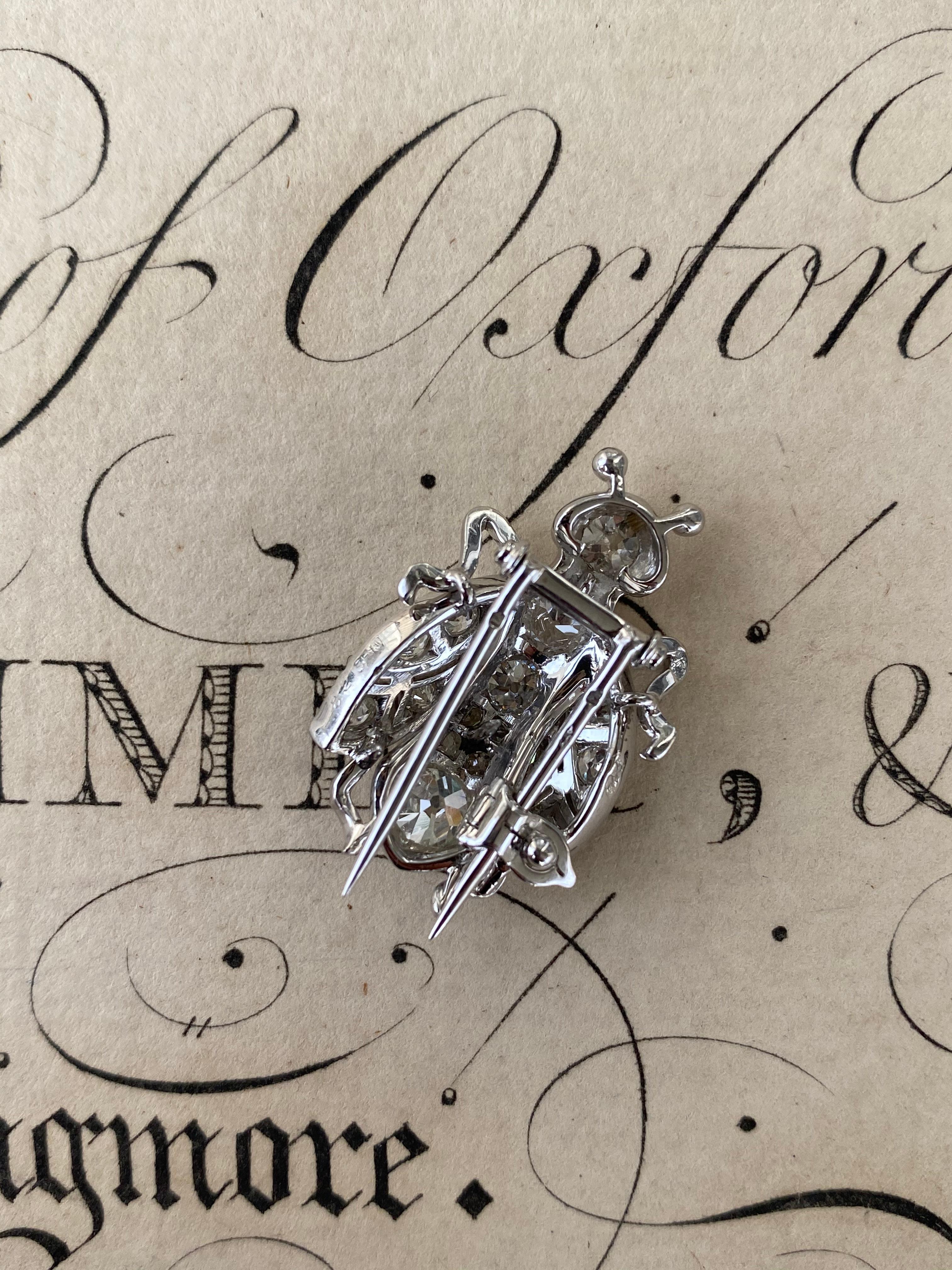 Will you bee mine? This fabulous French Art Deco clip buzzes with approximately 2.80 carats of sparkling old cut diamonds, this little guy is just as beautifully finished on the reverse. Scroll through to see the exceptional a jour settings.