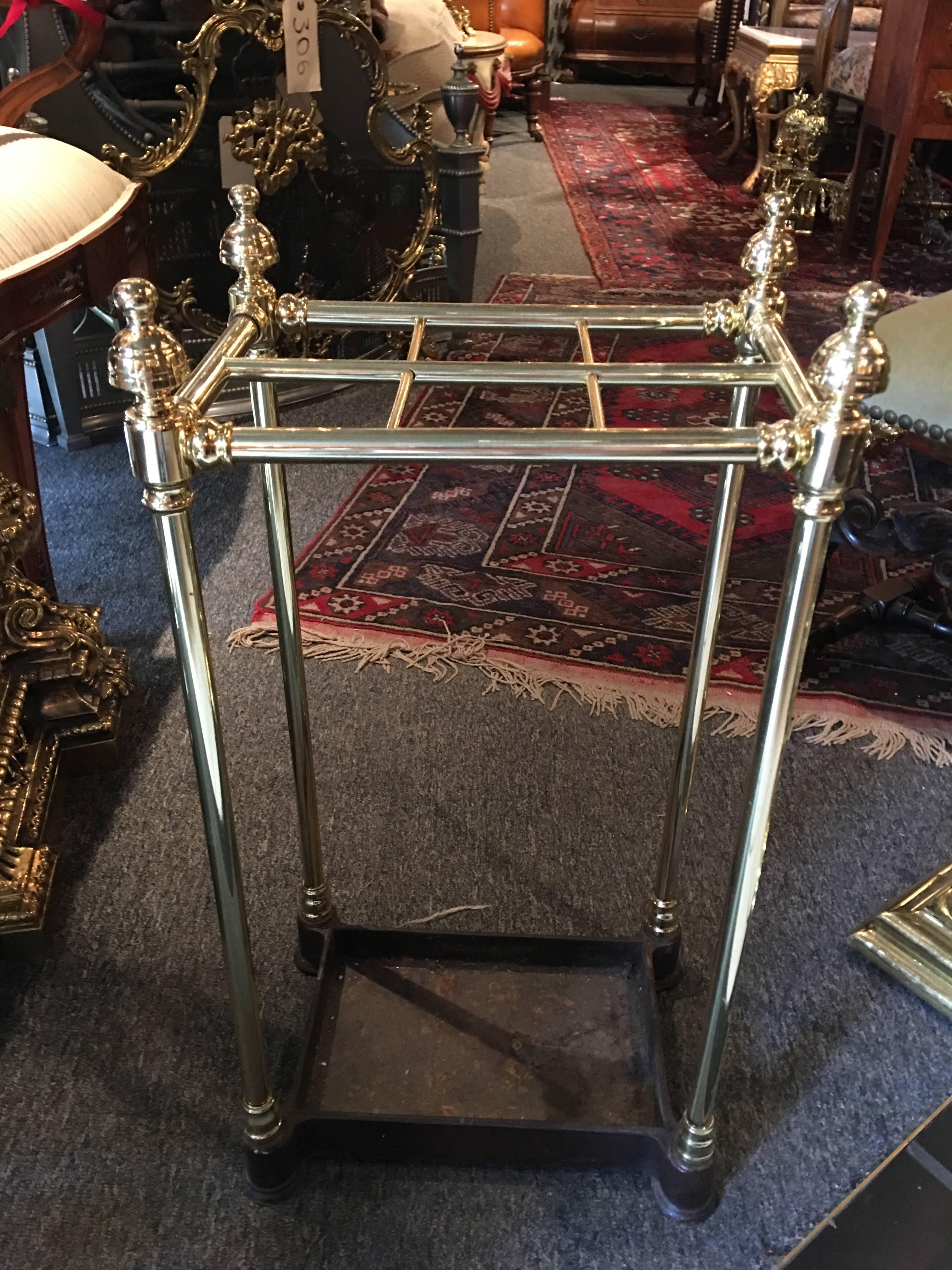 French polished brass and iron umbrella stand, 19th century.