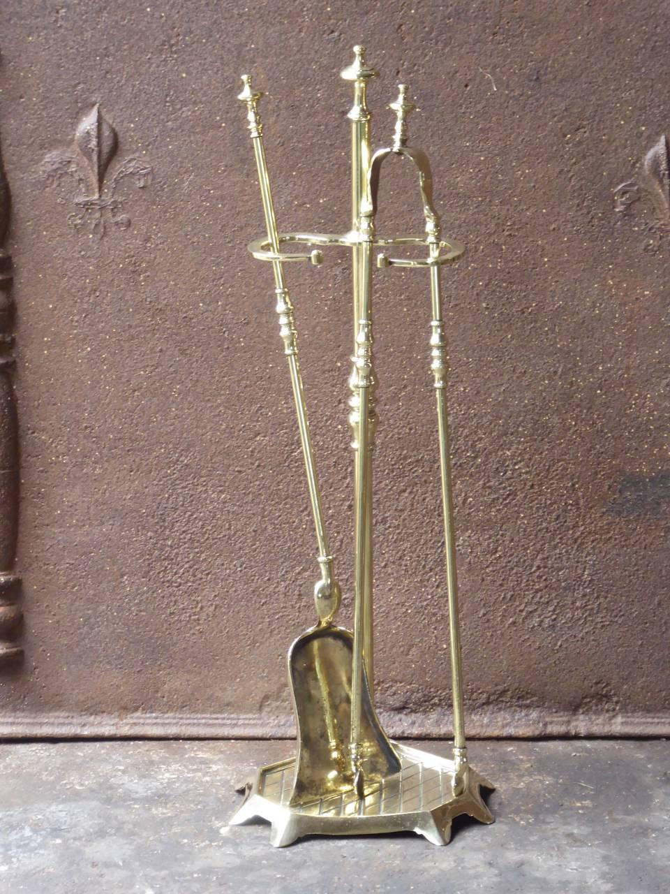 French fireplace tool set, fire irons made of polished brass.

We have a unique and specialized collection of antique and used fireplace accessories consisting of more than 1000 listings at 1stdibs. Amongst others, we always have 300+ firebacks,