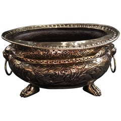 Jardiniere con manico ad anello in ottone lucido francese con piedi ad artiglio, XIX secolo