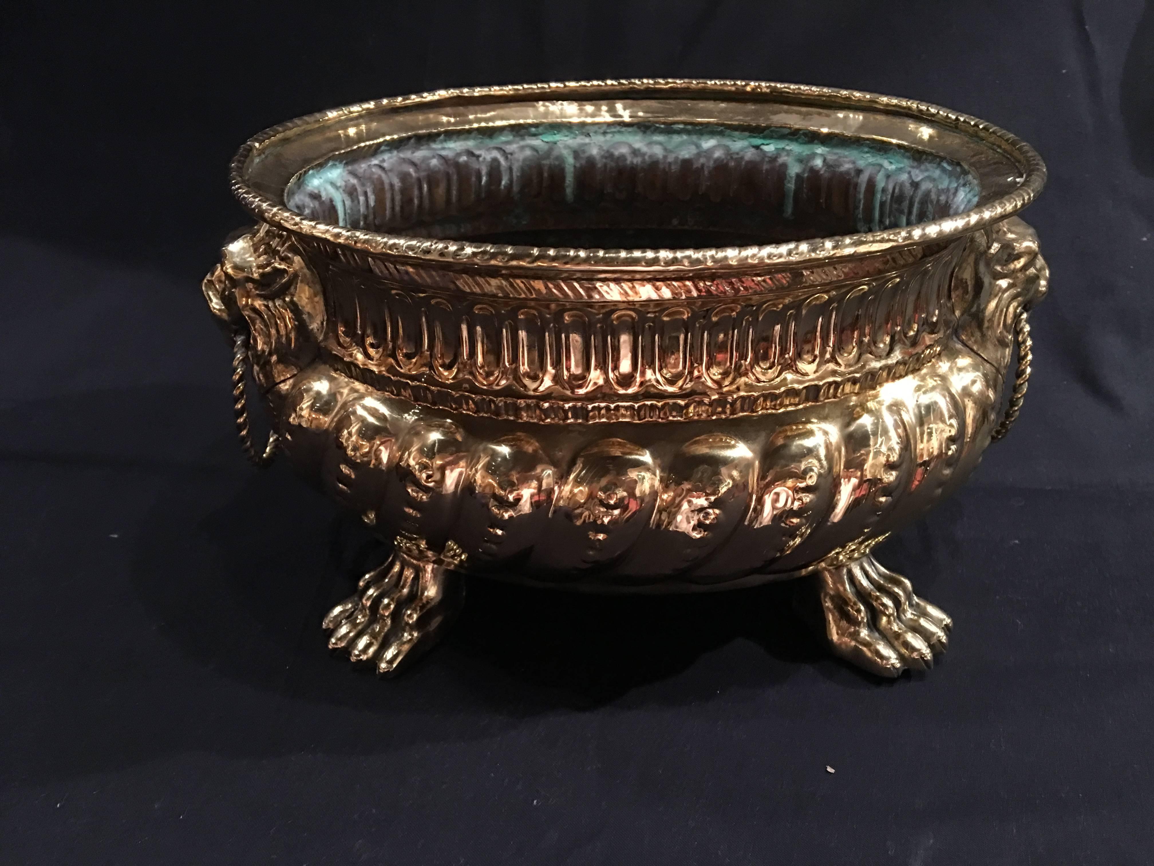 French polished brass round jardiniere or planter with handles, 19th century.