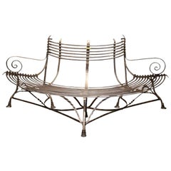 Banc de jardin en forme d'arbre:: en fer poli:: signé Sauveur