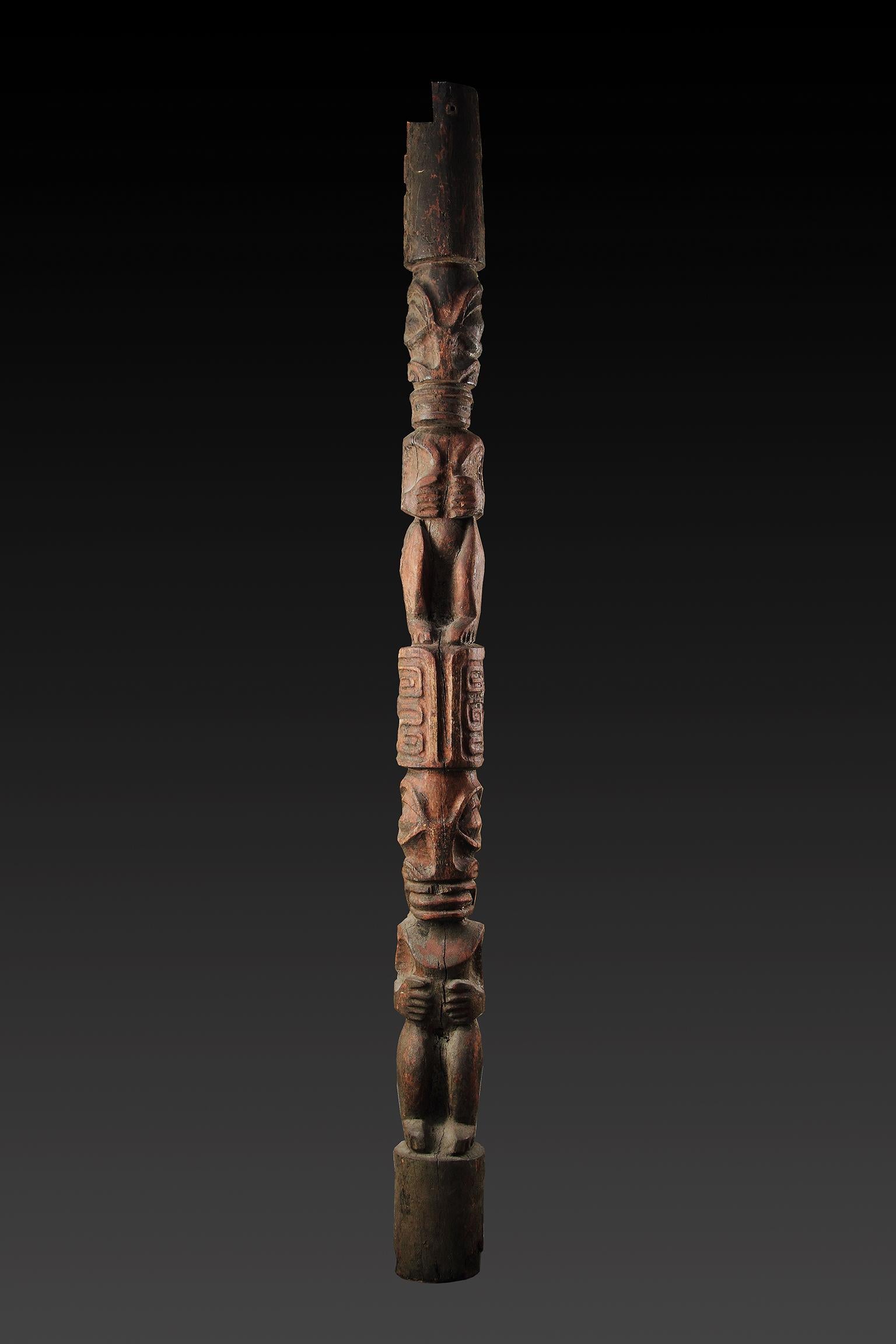A Very Large French Polynesian Marquesas Islands Nuku Hiva House Post Carved with Ritual Tiki Figures 
Late 19th Century - Early 20th century 

Size: 288cm high - 113½ ins high / 9 feet 5½ ins 

These large human images are the most imposing of all