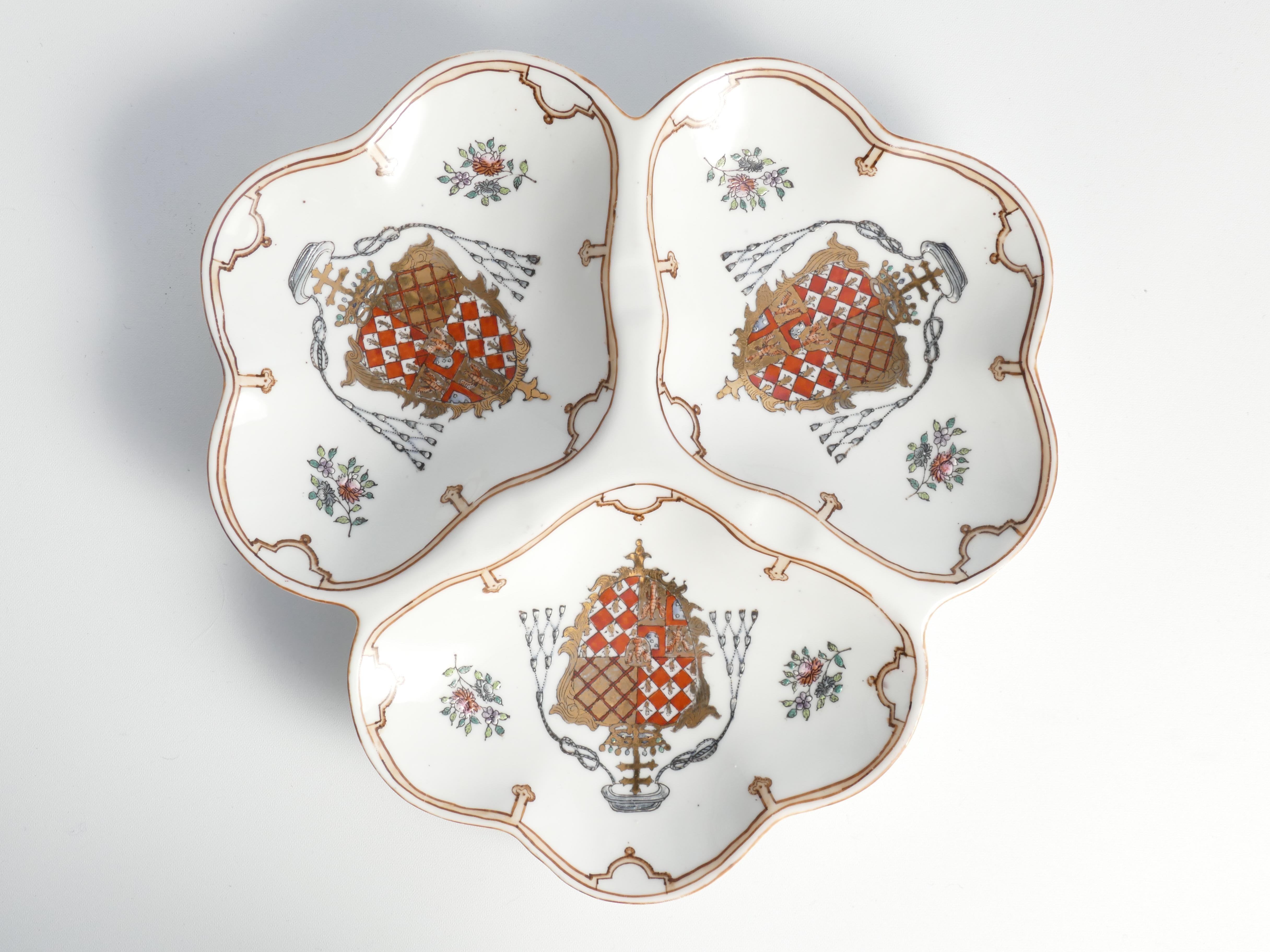House of Toussi Court: French Ceramic Divided Presentation Dish

This elegant House of Toussi Court divided presentation dish, featuring a hand-painted coat of arms decor and a beautiful repeating pattern all around. Signed and marked on the bottom