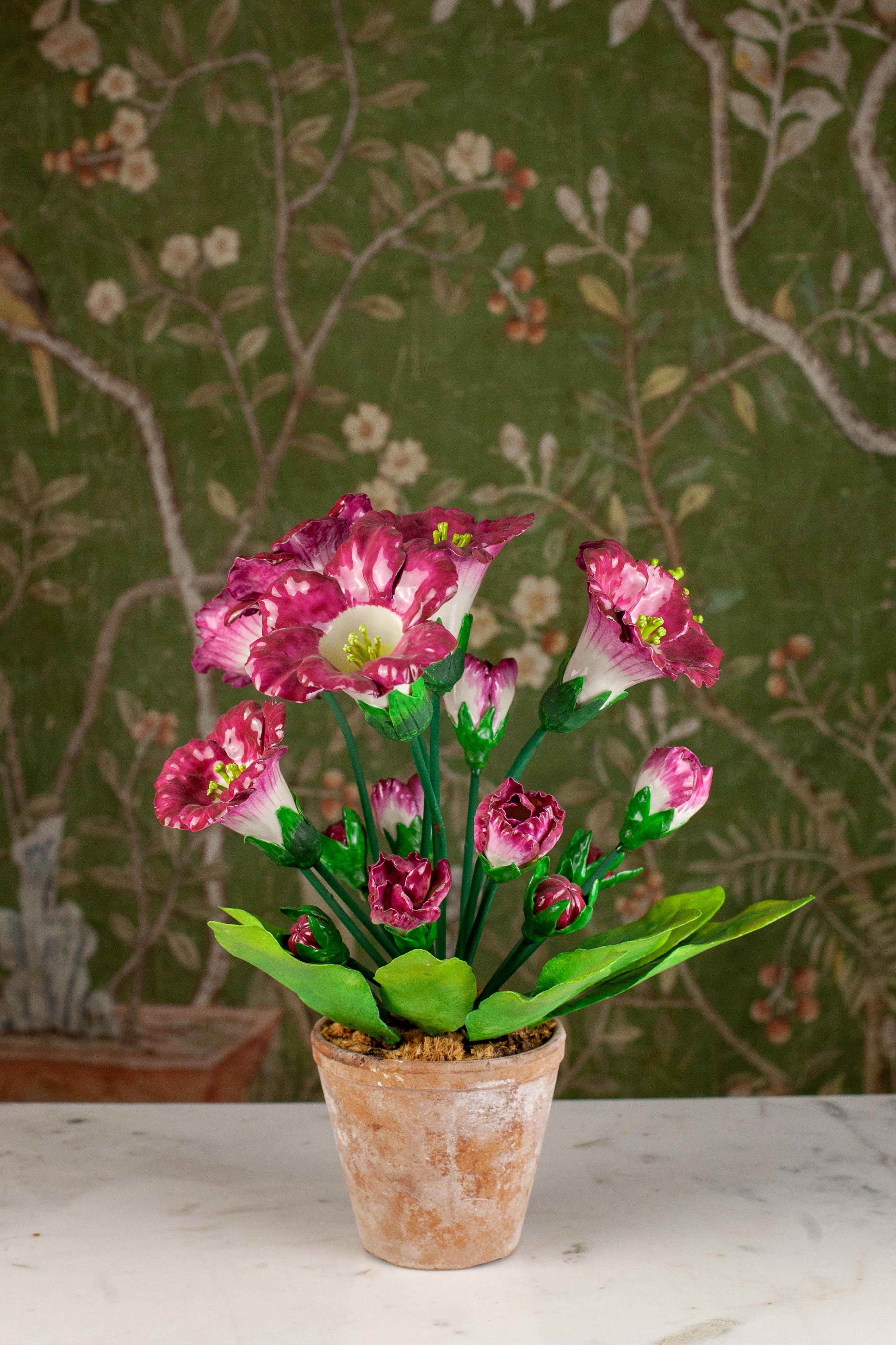 French porcelain and hand painted metal flower specimens originally purchased in the 1980's and fresh to the market, this is one of many pieces offered by fleurdetroit. This collections heralds from the esteemed David Hicks store in Paris.