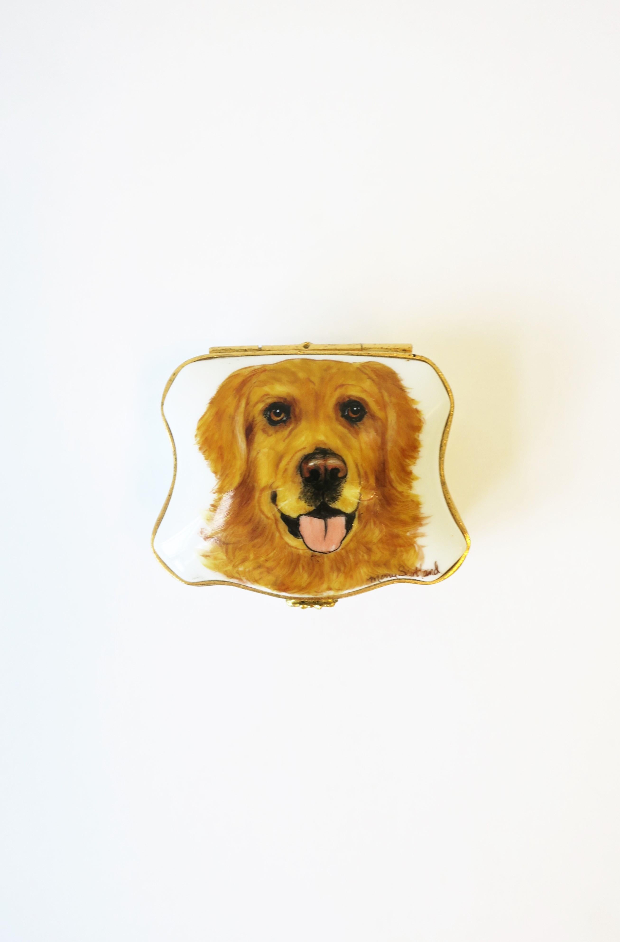 A beautiful French white porcelain and gold brass jewelry box with hand-painted golden retriever dog, circa mid-20th century, Limoges, France. Box is hand-painted on top with golden retriever dog and inside with bird/duck design. Great as a small