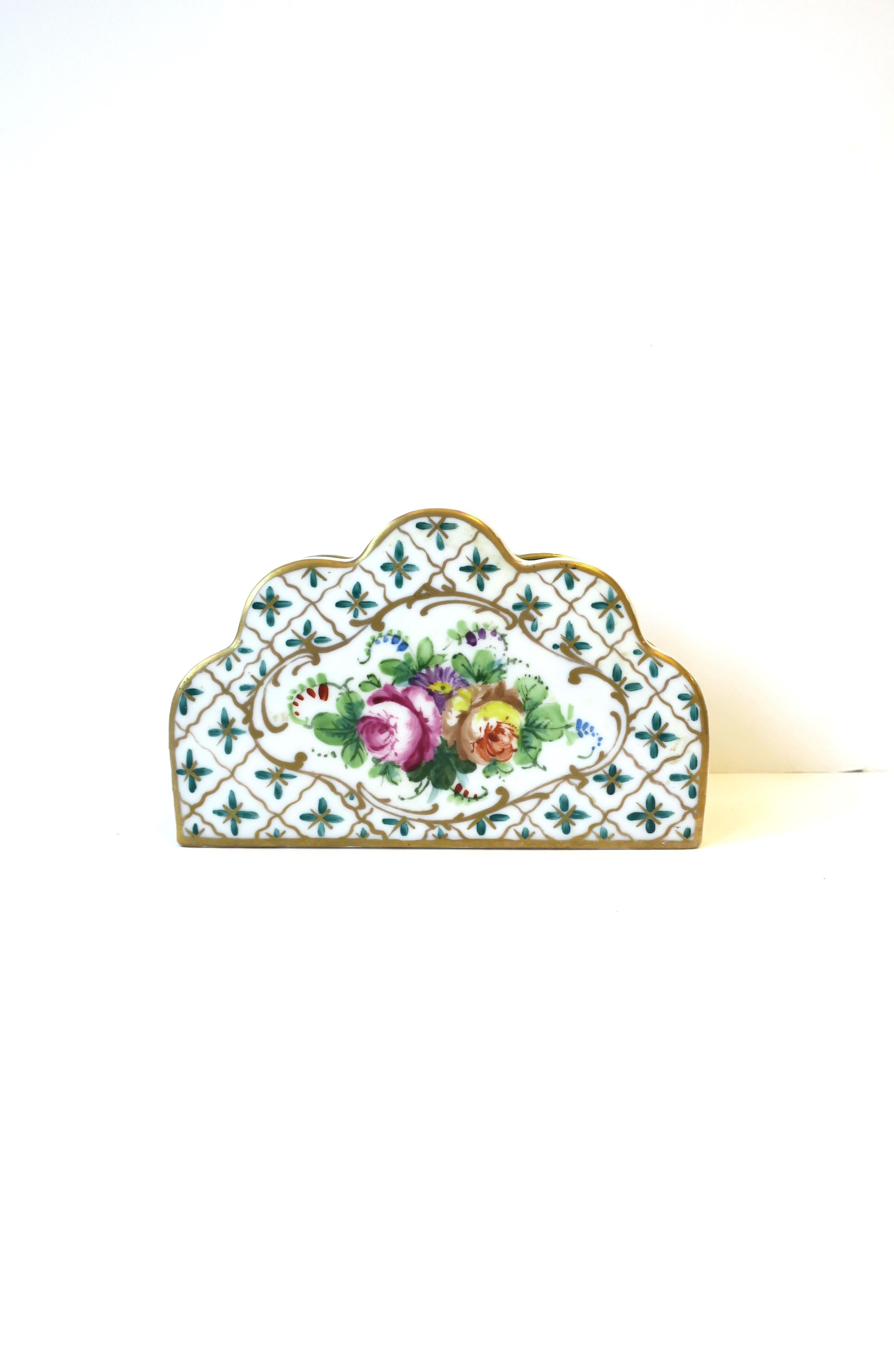 A very beautiful hand-painted French porcelain mail letter desk holder, circa early-20th century, France. 
Colors include Emerald green, gold, orange/red, pink, purple, yellow, and touches of blue, all on a white porcelain ground. Markers' mark on