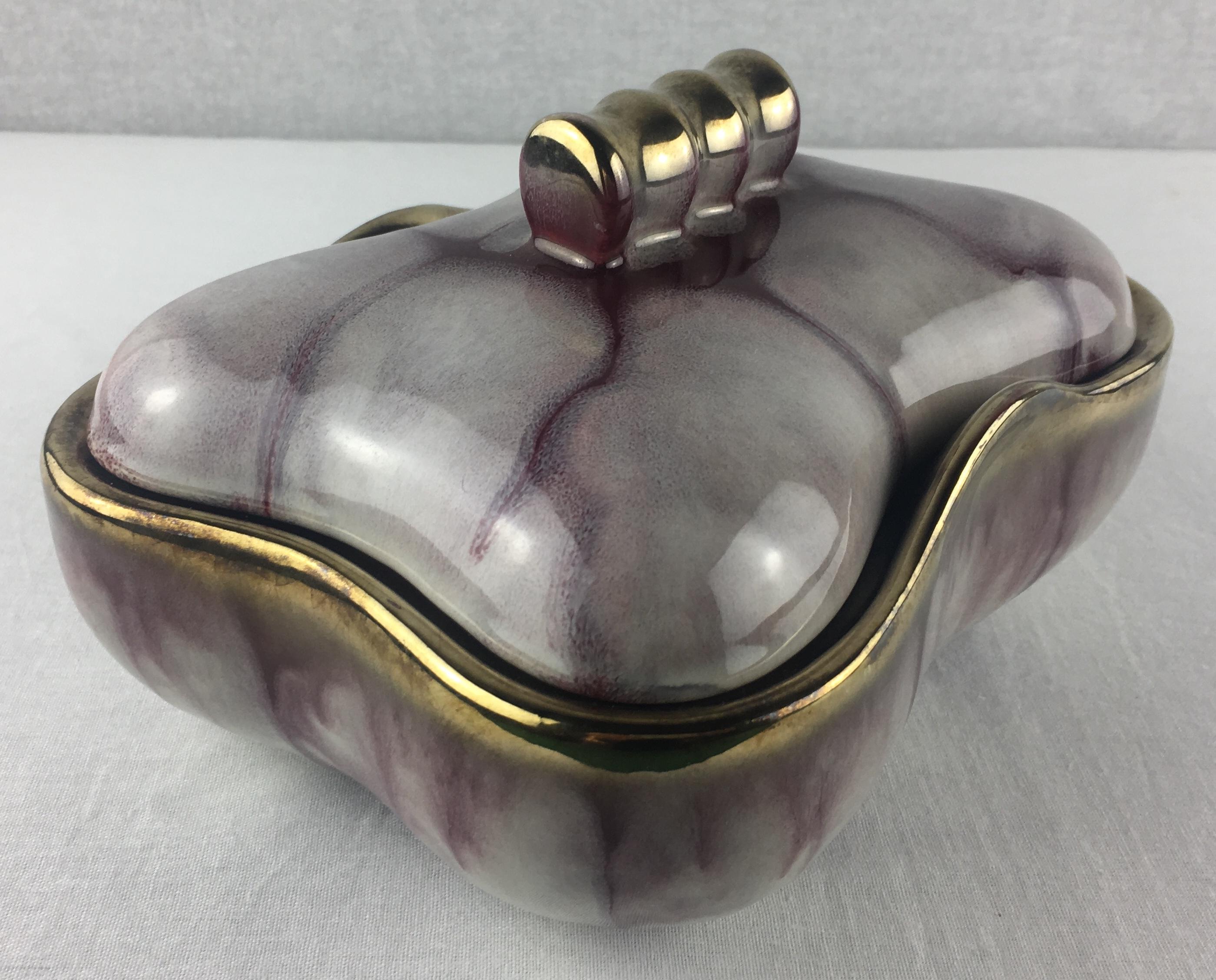 Beautiful hand painted porcelain decorative candy dish, trinket, or jewelry box. 

The decoration consists of under glaze - dégradée colors including light grey, burgundy and gold. Gorgeous hand painted piece. 

Measures: 8.25