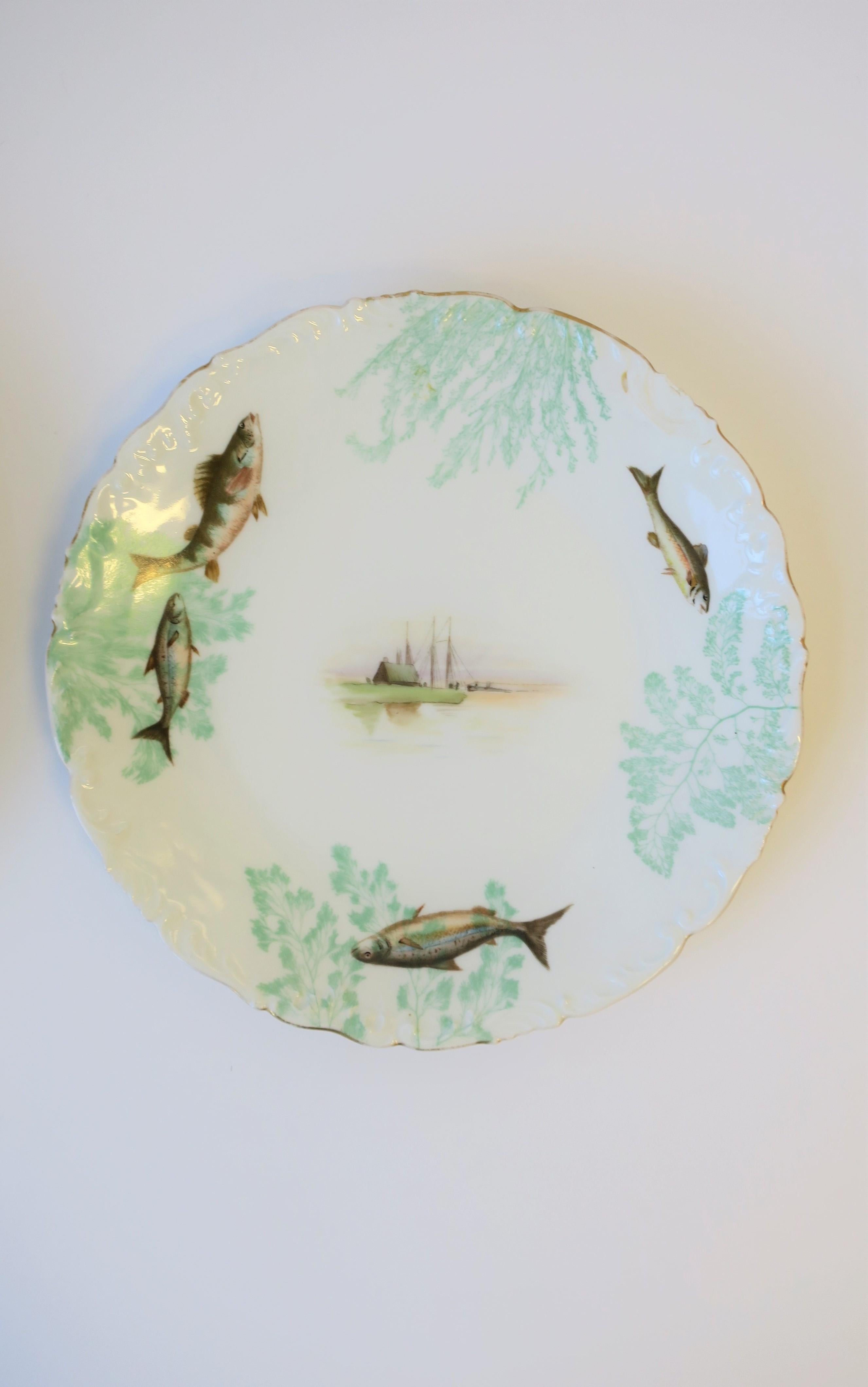 French Limoges Porcelain Dinner Plates with Rustic Fish & Boat Design, Set of 8 For Sale 3