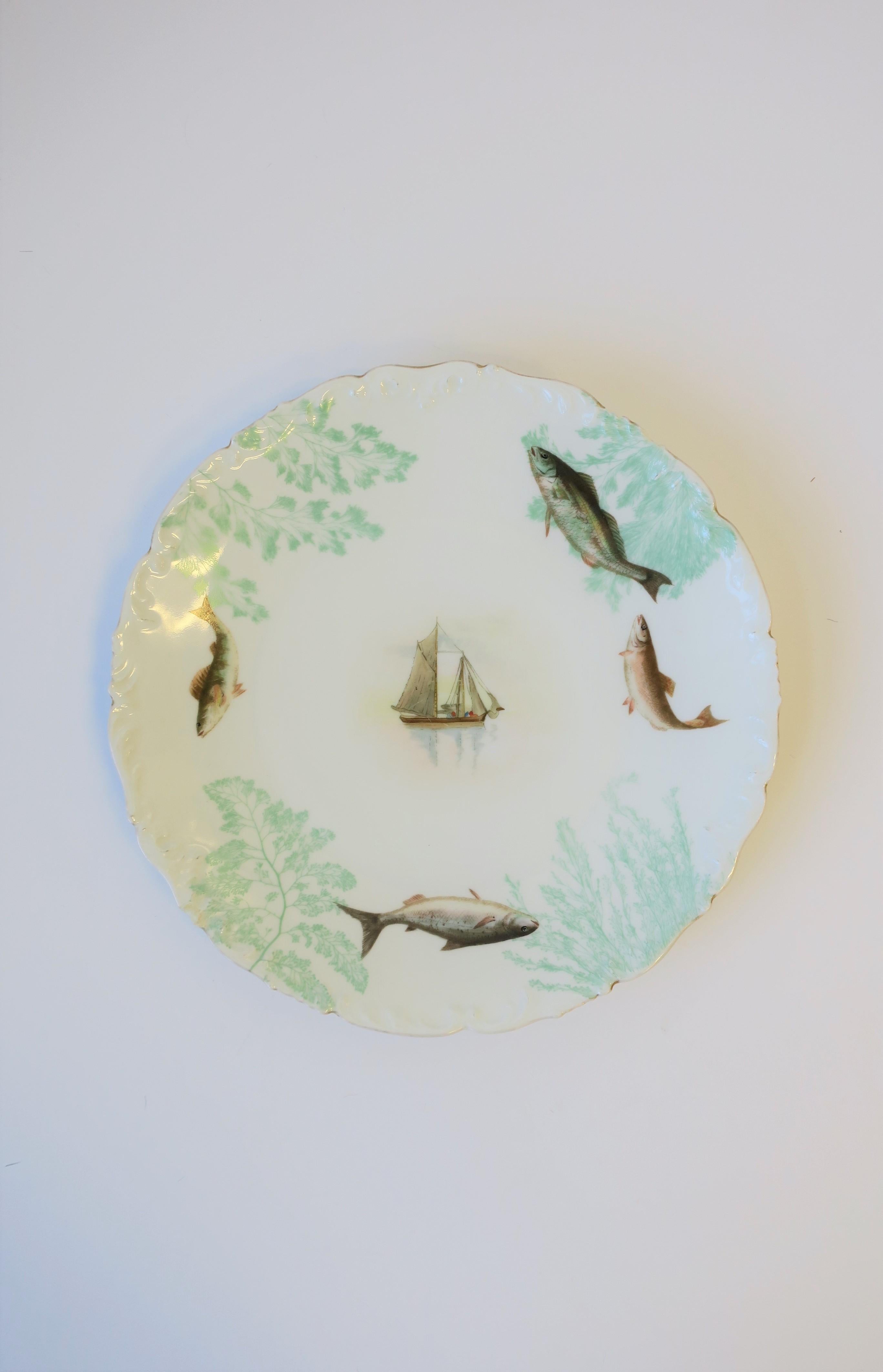 French Limoges Porcelain Dinner Plates with Rustic Fish & Boat Design, Set of 8 For Sale 4