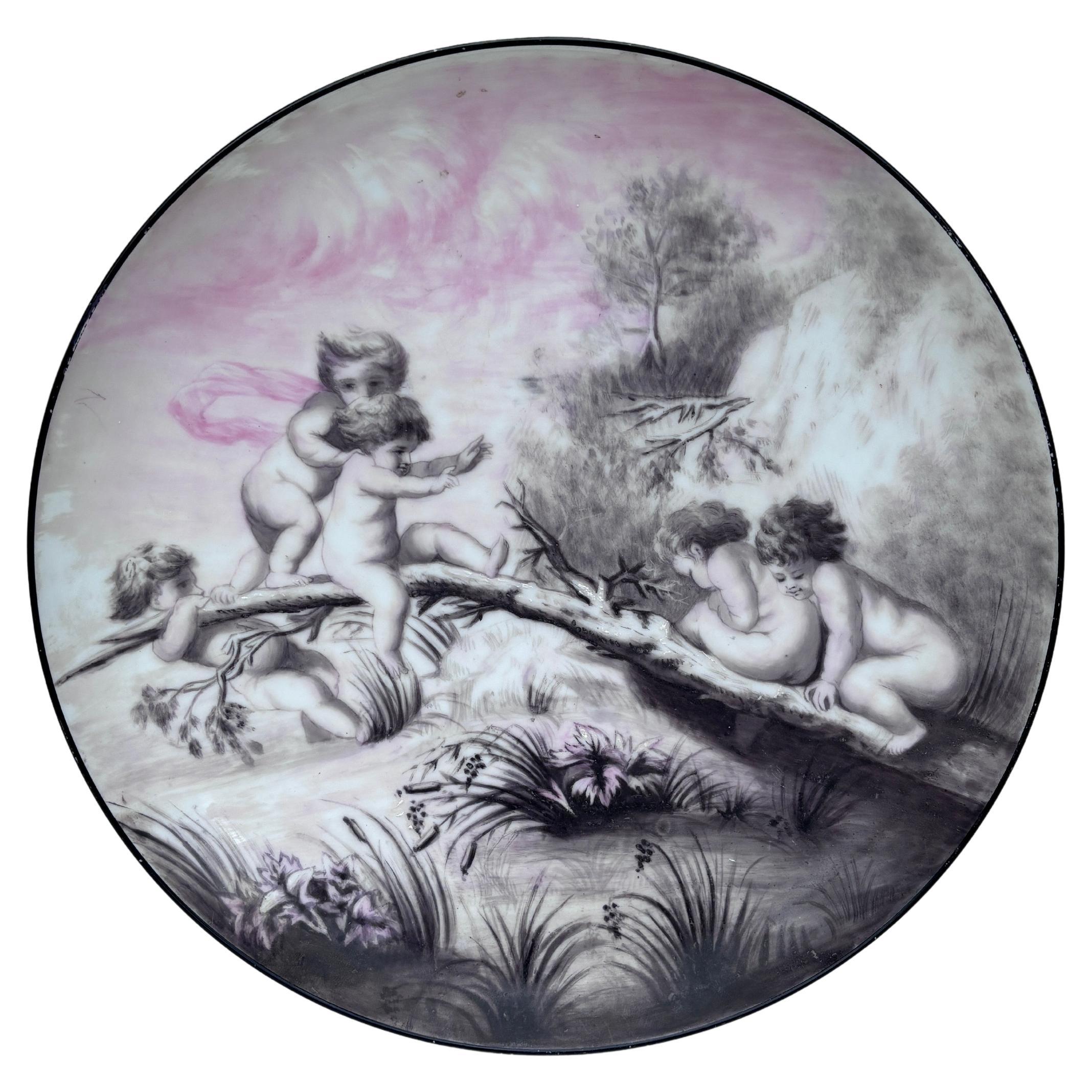 Plat Puttis en porcelaine française Circa 1900 en vente