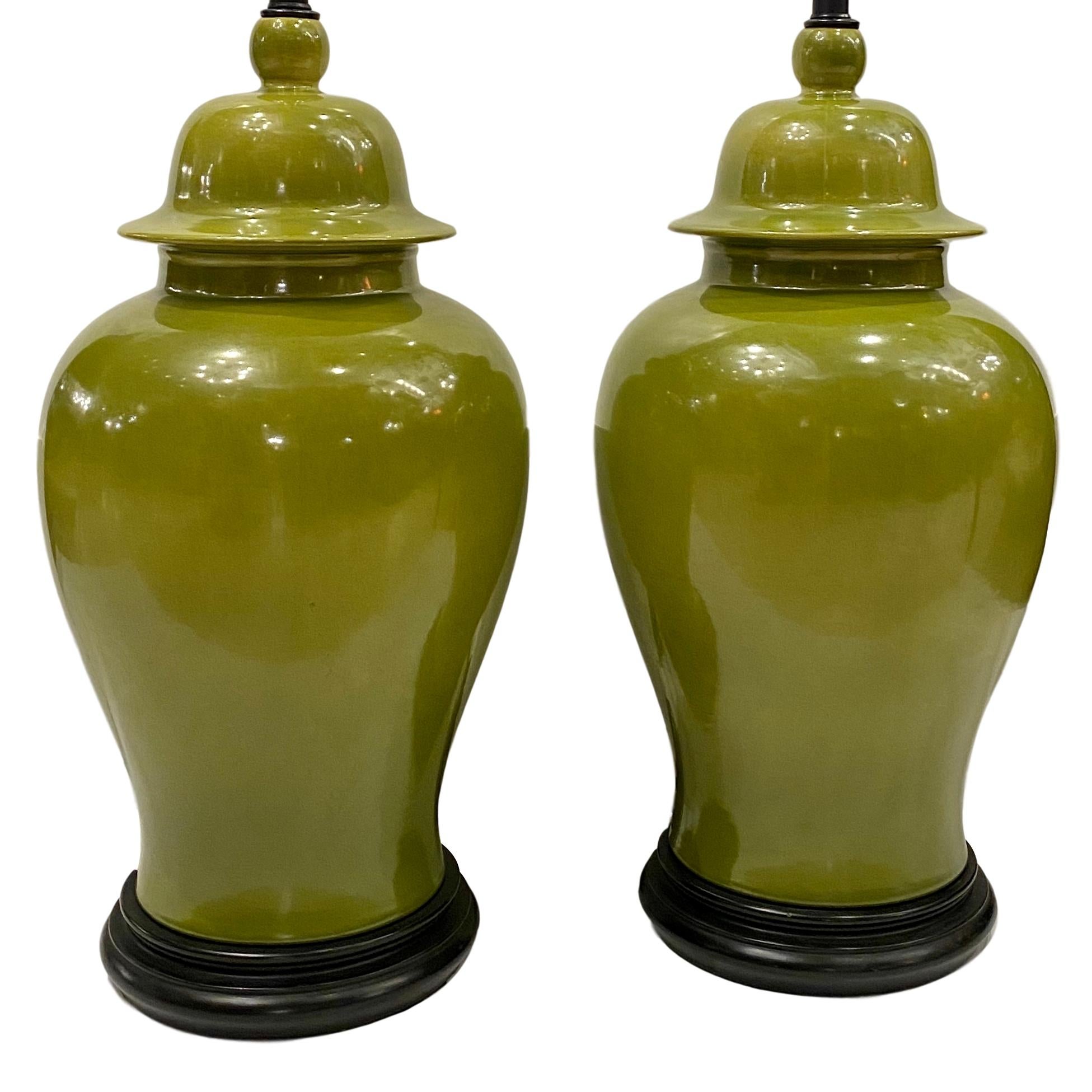 Pair of circa 1940s French porcelain table lamps in the form of large ginger jars.

Measurements:
Height of body 23