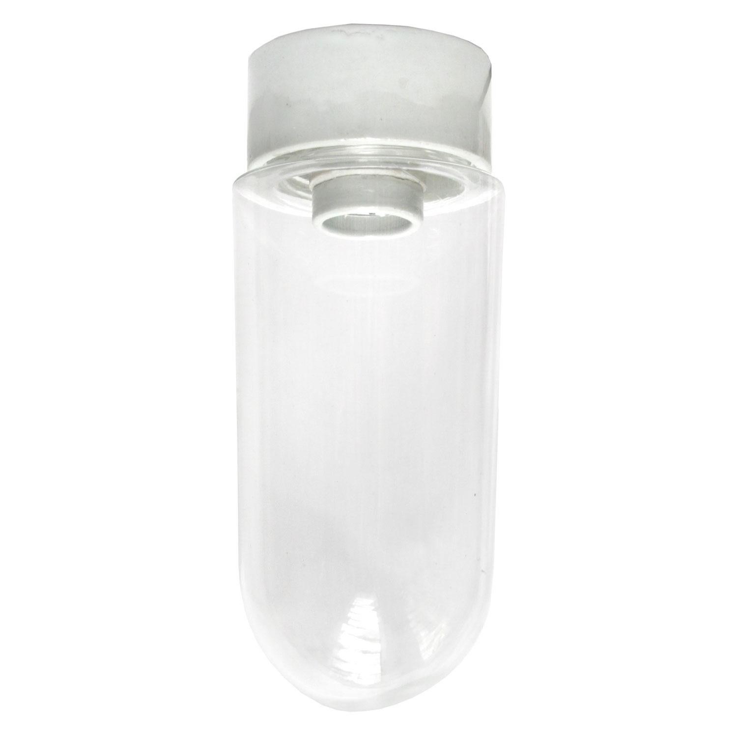 Industrial ceiling lamps. White porcelain. Clear glass.

2 conductors, no ground.
Measures: Diameter foot 10 cm
Suitable for 110 volt USA
new wiring is CE certified (220 volt)  or UL Listed (110 volt) 

Weight: 1.0 kg / 2.2 lb

Priced per individual