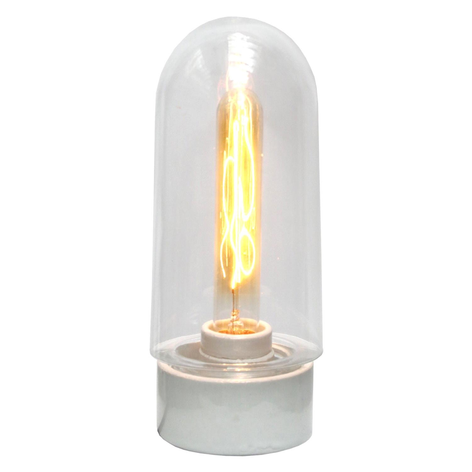 Industrial wall lamp scone. White porcelain. Clear glass.

2 conductors, no ground.
Measures: Diameter foot 10 cm
Suitable for 110 volt USA
new wiring is CE certified (220 volt)  or UL Listed (110 volt) 

Weight: 1.0 kg / 2.2 lb

Priced per