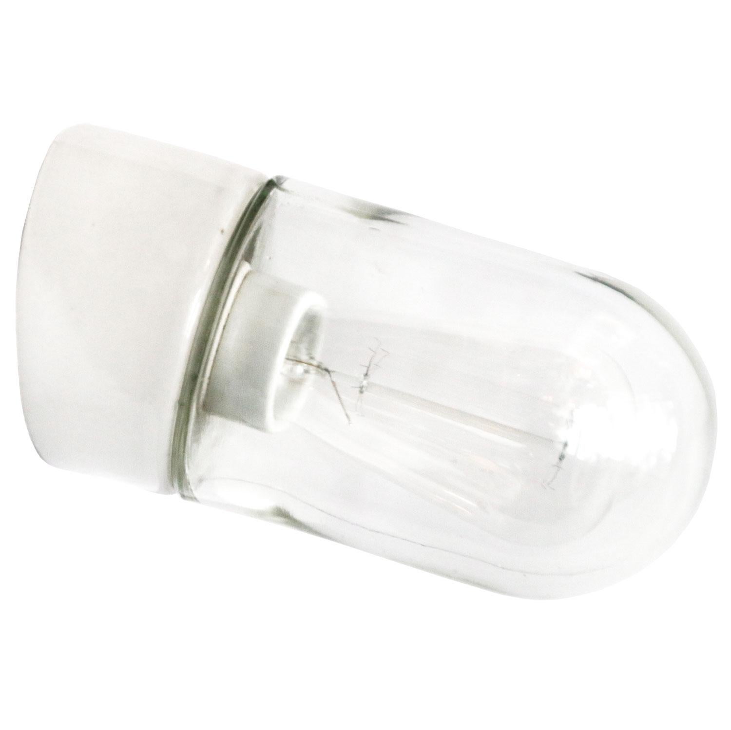 Industrial ceiling lamp. White porcelain. Clear glass.

2 conductors, no ground.
Measures: Diameter foot 10 cm
Suitable for 110 volt USA
new wiring is CE certified (220 volt)  or UL Listed (110 volt) 

Measure: Weight: 0.9 kg / 2 lb

Priced per