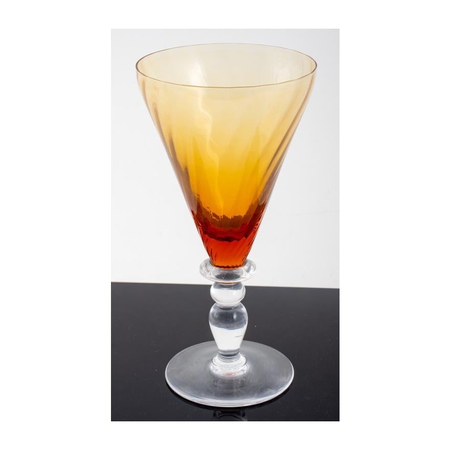 
Indulge in the elegance of French craftsmanship with this exquisite Portieux Amber Crystal Stemware service, meticulously designed for 11 people. Elevate your dining experience with these pieces that exude sophistication and artistry, featuring the